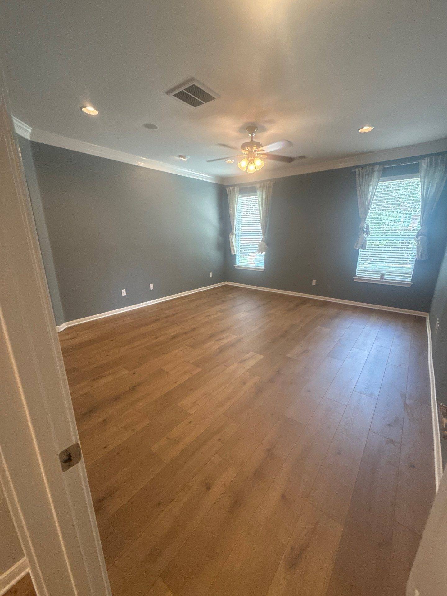 Master bedroom of a home on Coalwood Cove in Austin, TX ahead of interior painting by Hill Country Painting