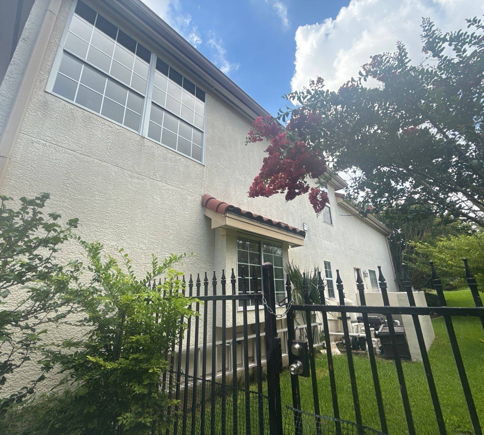 Side exterior of a home on Wingreen Loop in The Hills, TX ahead of exterior painting by Hill Country Painting