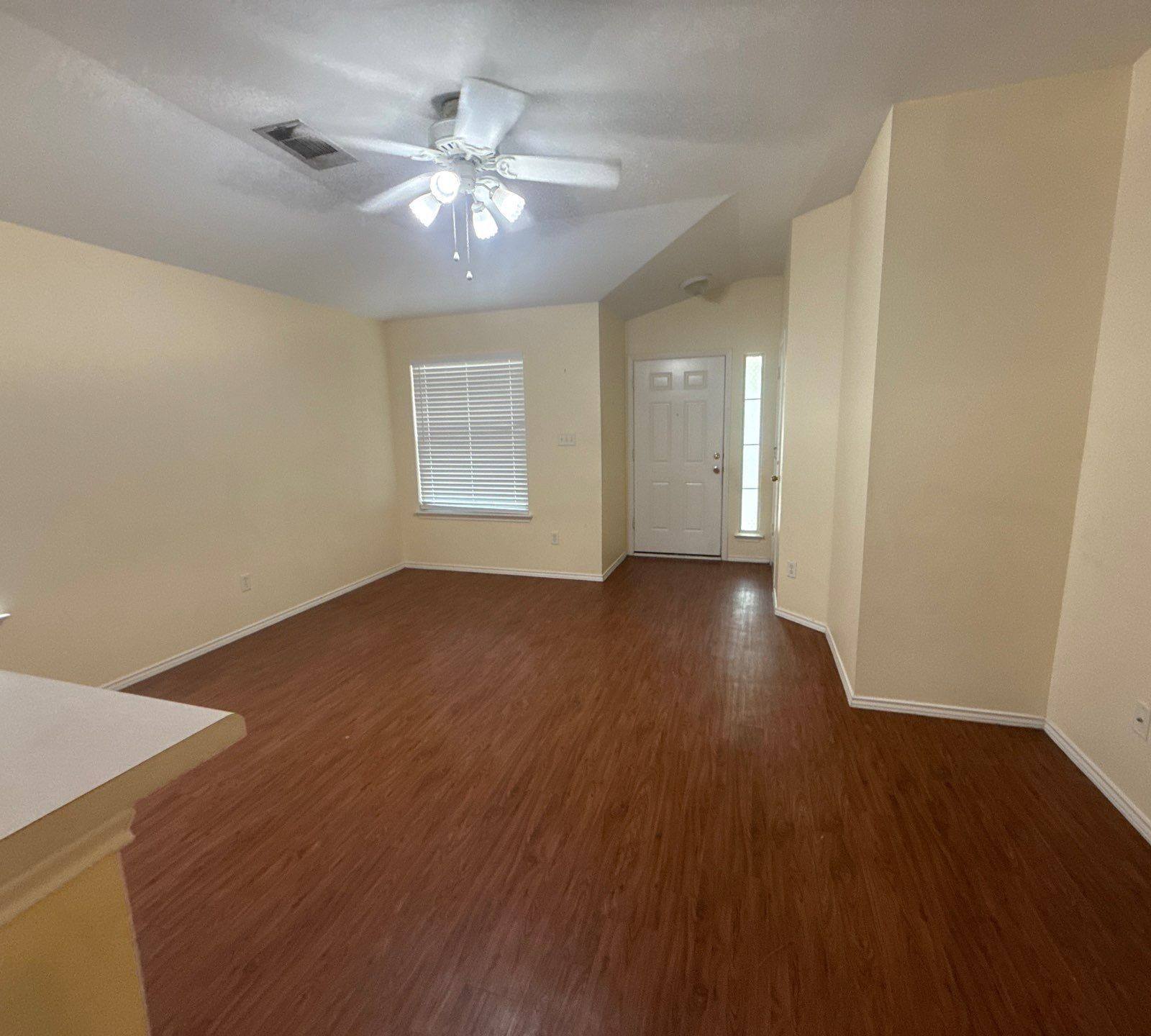 Living room of a home on Socorro Bend in Leander, TX ahead of interior painting by Hill Country Painting