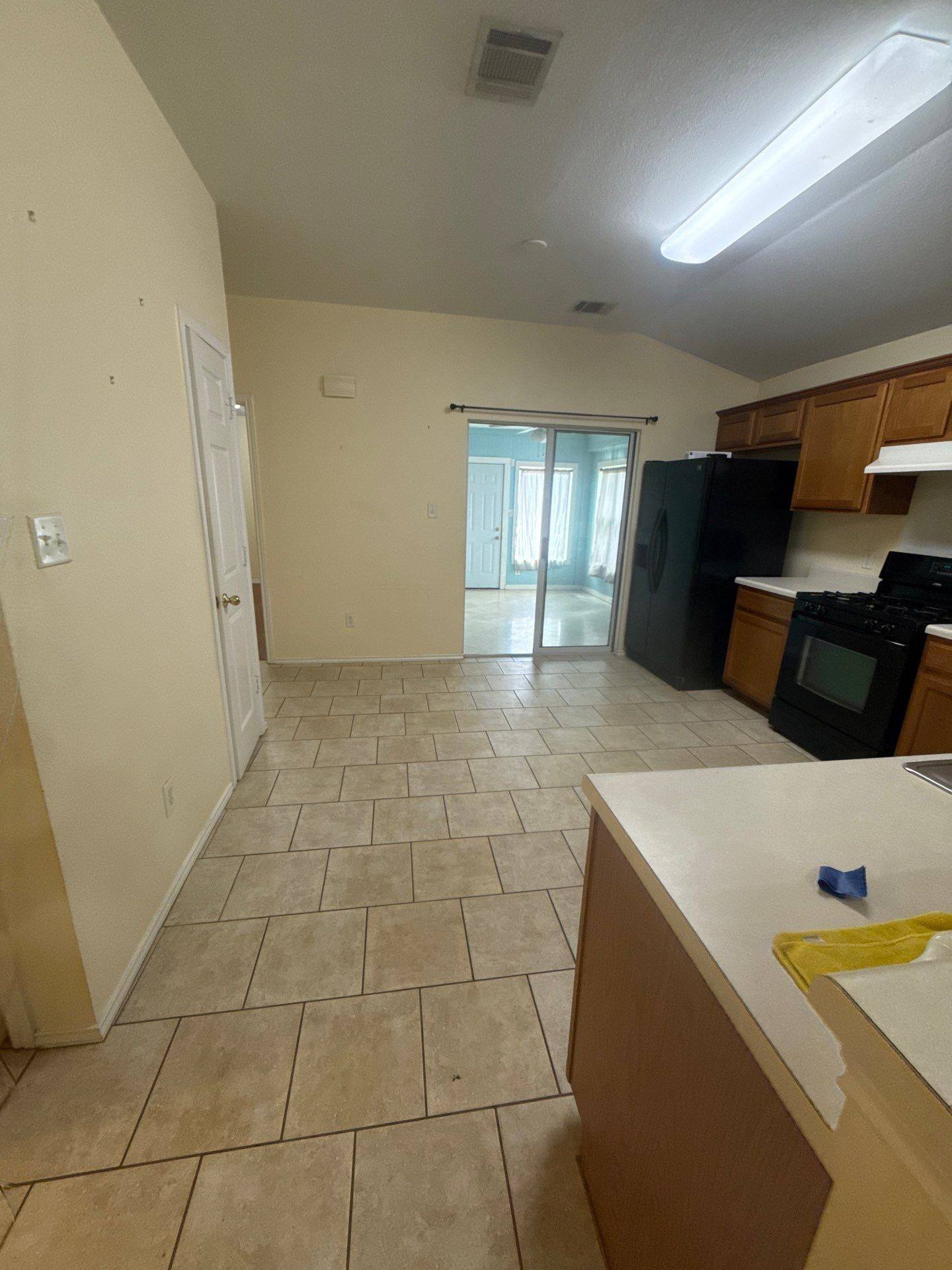 Kitchen of a home on Socorro Bend in Leander, TX ahead of interior painting by Hill Country Painting