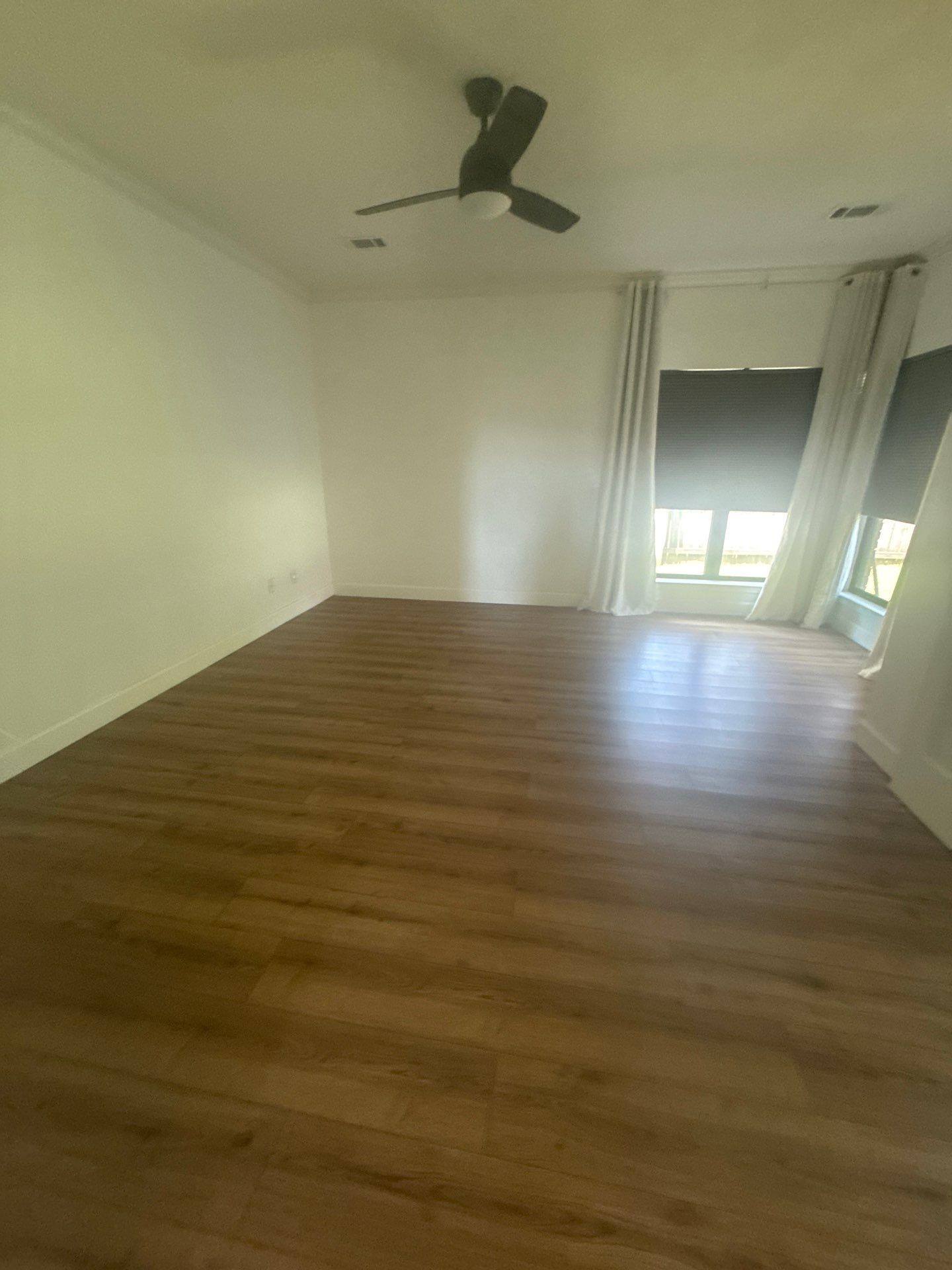 Living area of a home on Poynette Pl in Austin, TX ahead of interior painting by Hill Country Painting