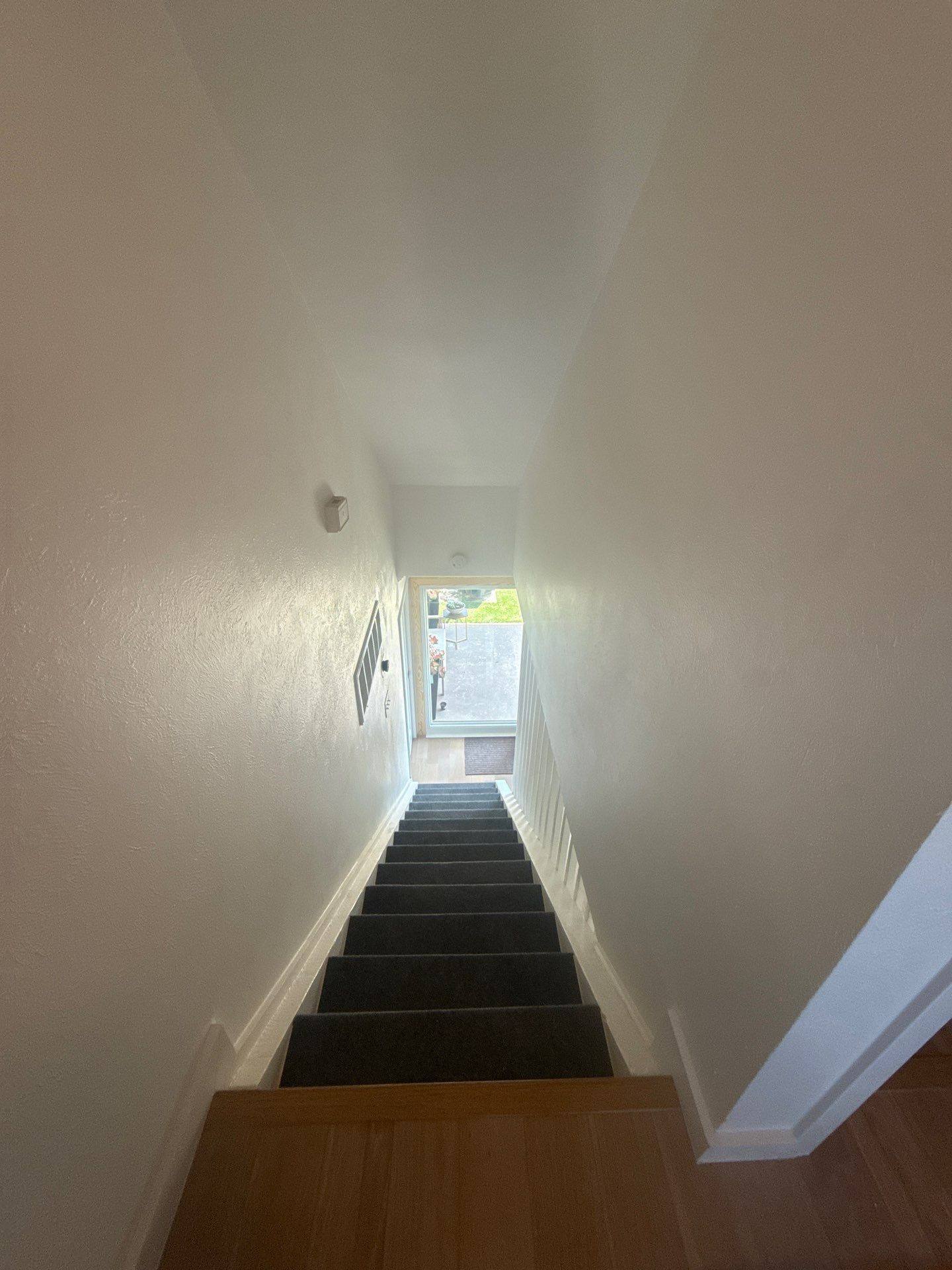 Stairwell in a home on W Braker Ln in Austin, TX ahead of interior painting by Hill Country Painting