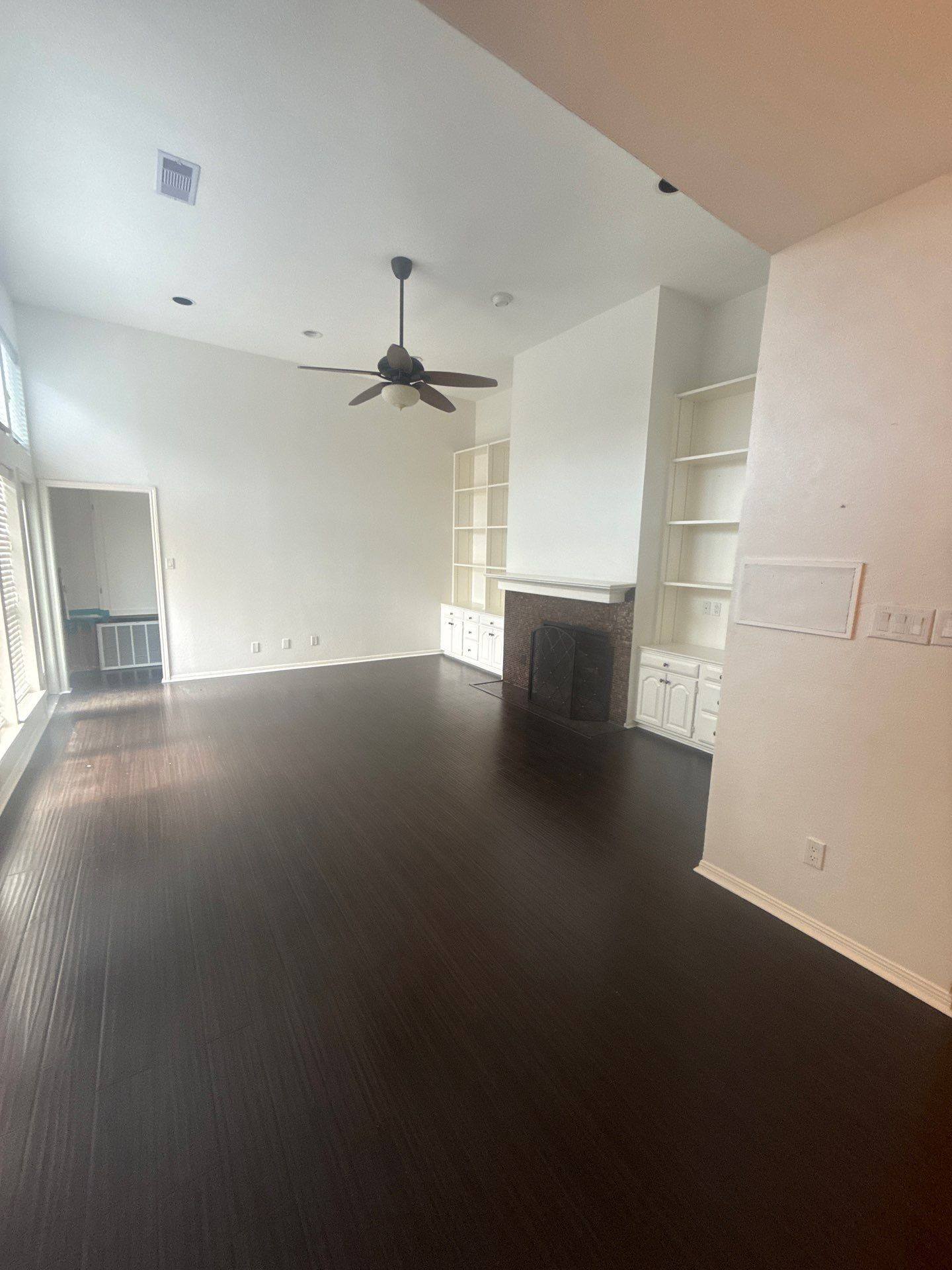 Living room in a home on Robbins Pl in Austin, TX ahead of interior painting by Hill Country Painting
