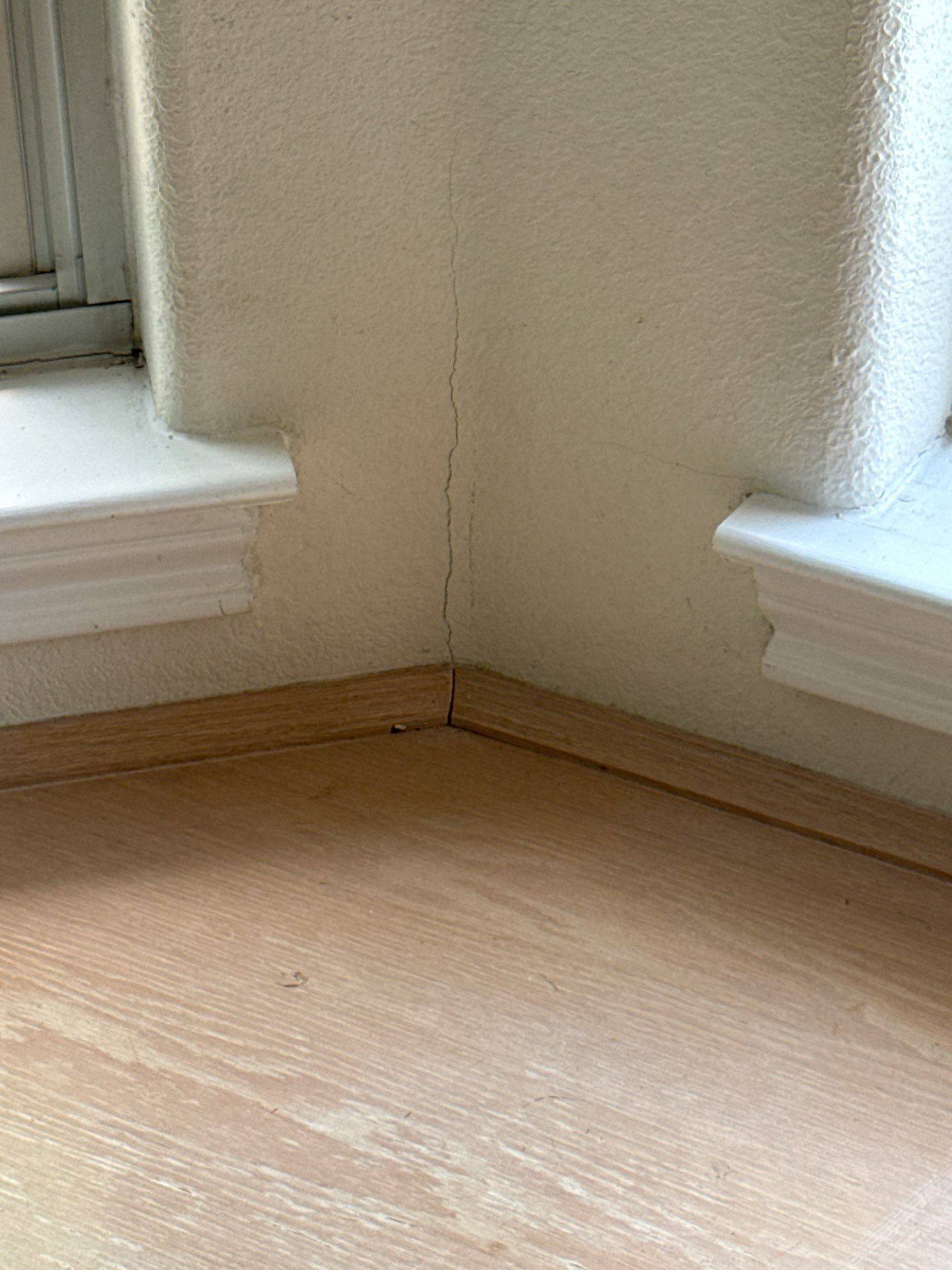 Wall corner with crack repair needed in a home on Winnipeg Cove in Austin, TX ahead of interior painting by Hill Country Painting