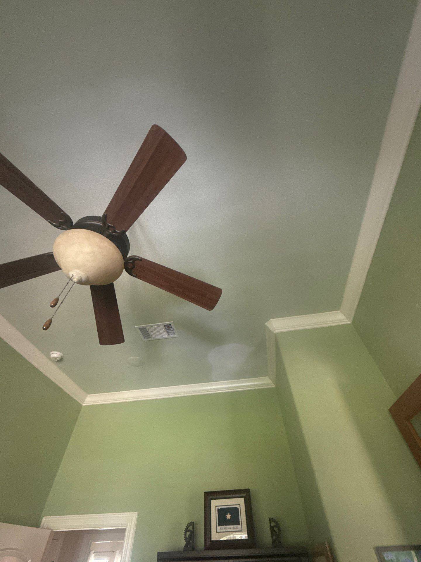 Office ceiling with ceiling fan and crown molding at a property on Tanksley Cir in Georgetown, TX ahead of interior ceiling painting by Hill Country Painting