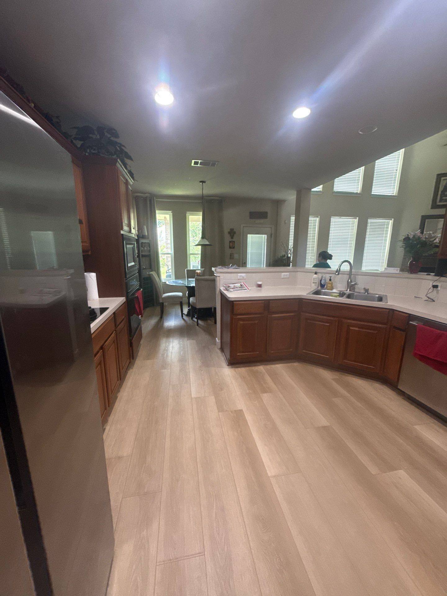 Kitchen at a property on Morgan Creek Dr in Austin, TX ahead of interior painting by Hill Country Painting