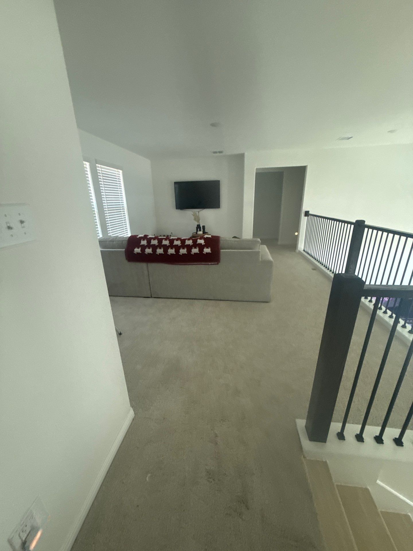 Living room at a property on Halas St in Manchaca, TX ahead of interior painting by Hill Country Painting