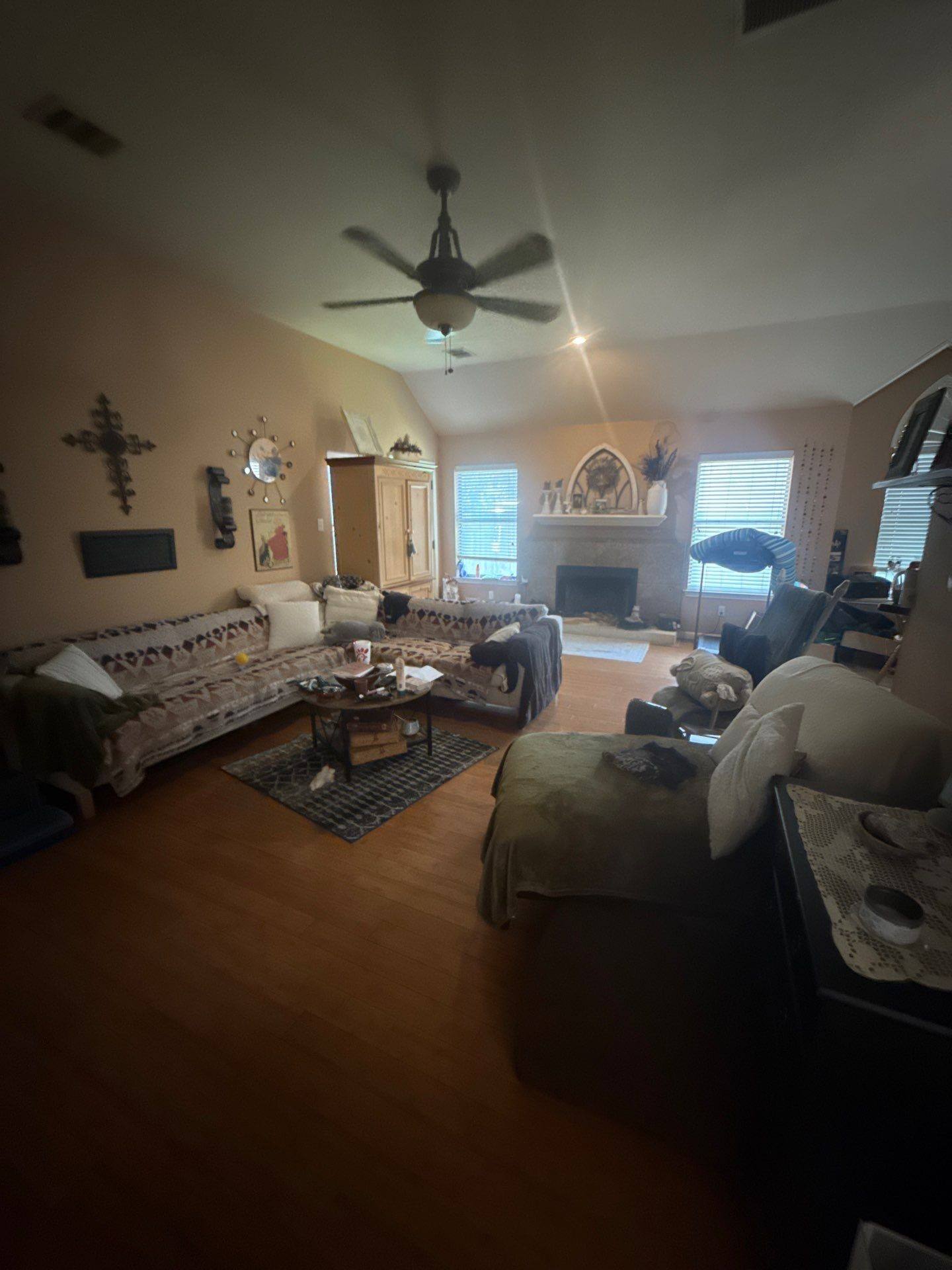 Living room at a property on Thunderbay Dr in Georgetown, TX ahead of interior painting by Hill Country Painting