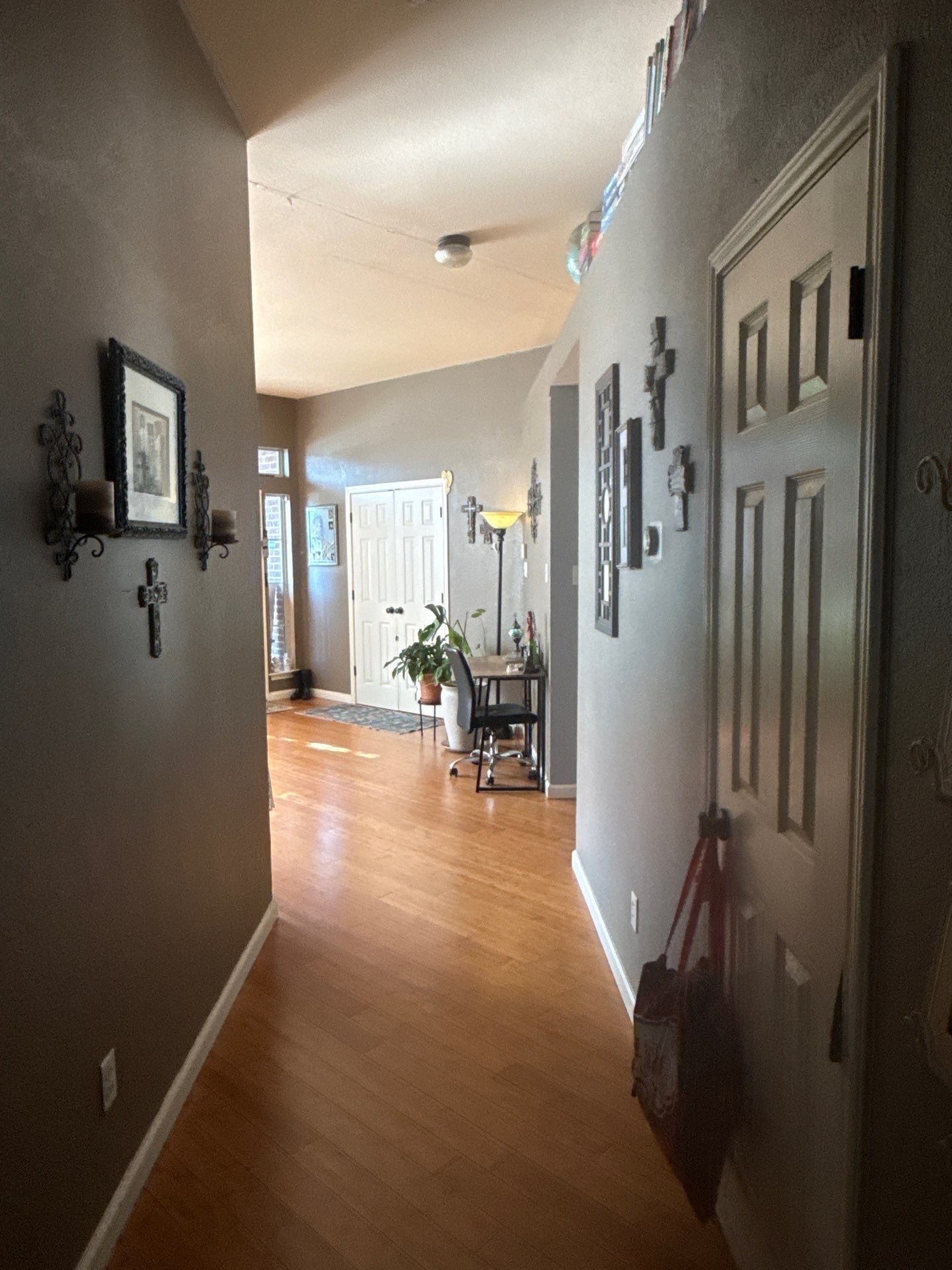 Hallway at a property on Thunderbay Dr in Georgetown, TX ahead of interior painting by Hill Country Painting