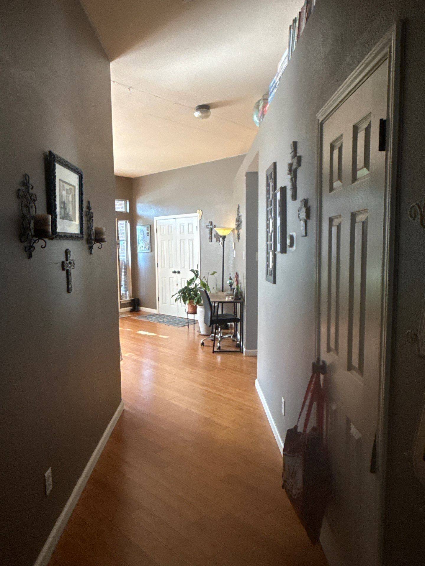 Hallway at a property on Thunderbay Dr in Georgetown, TX ahead of interior painting by Hill Country Painting