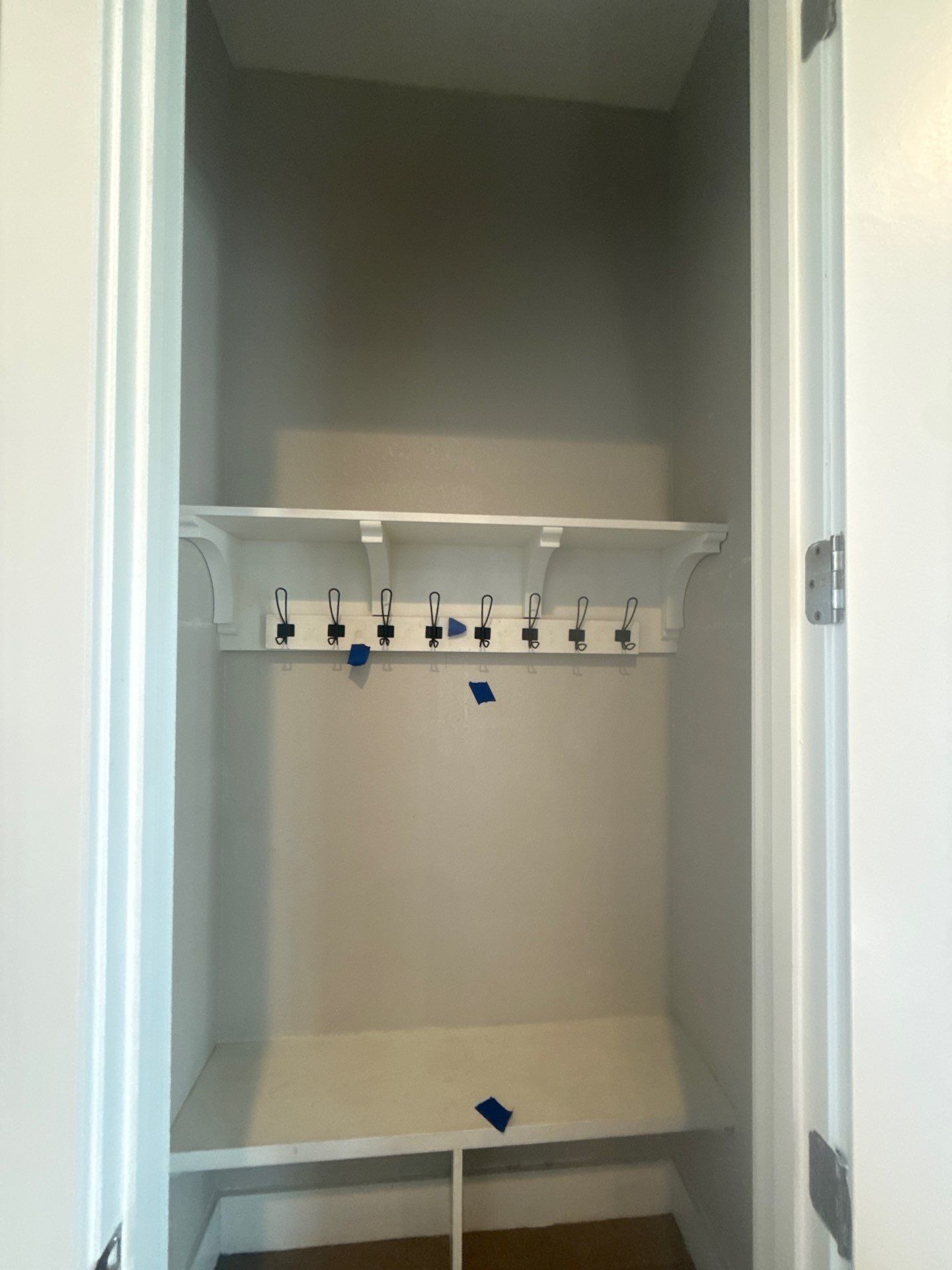 Coat closet at a property on Willow Hill Dr in Georgetown, TX ahead of interior painting by Hill Country Painting