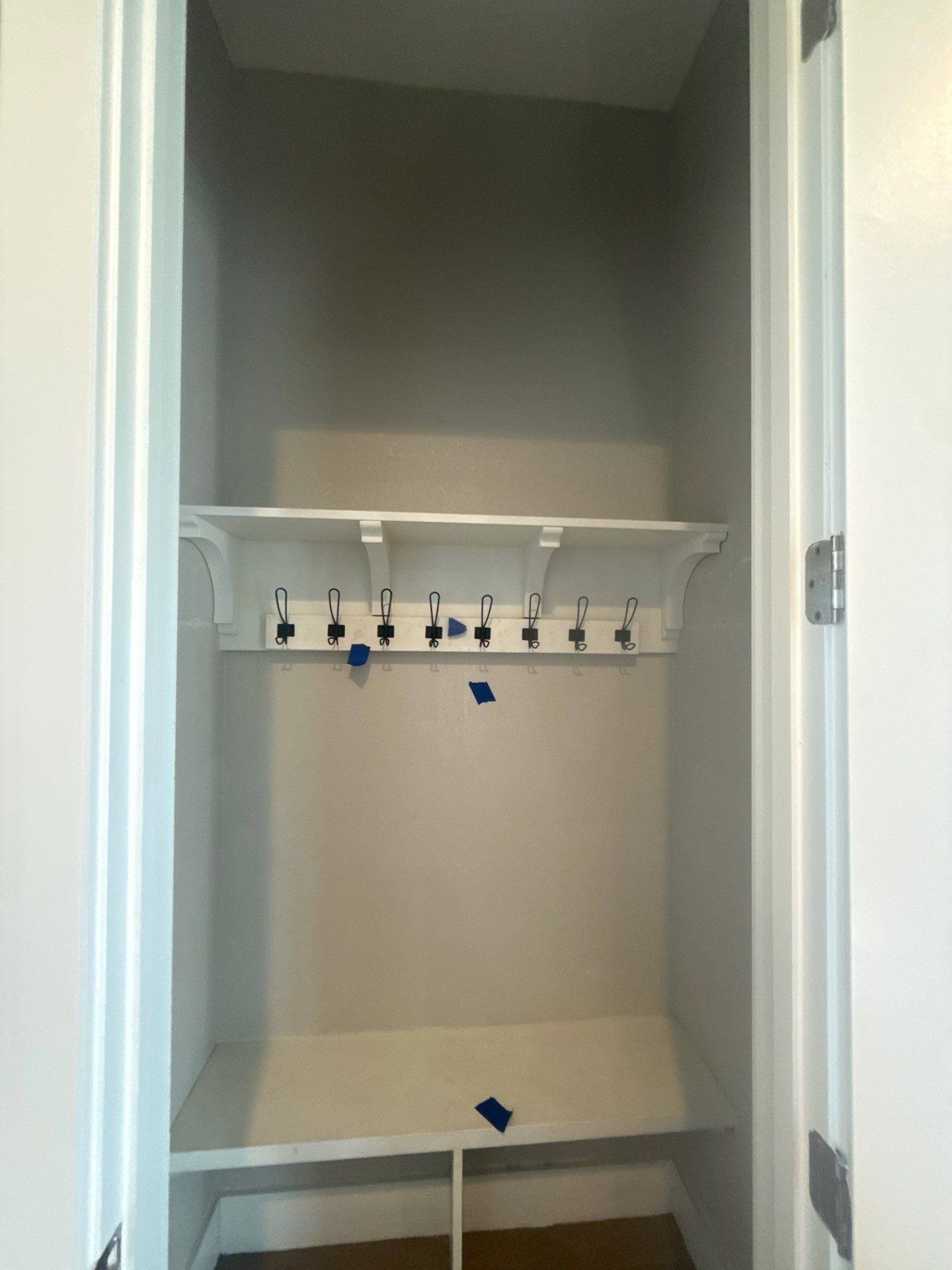 Coat closet at a property on Willow Hill Dr in Georgetown, TX ahead of interior painting by Hill Country Painting