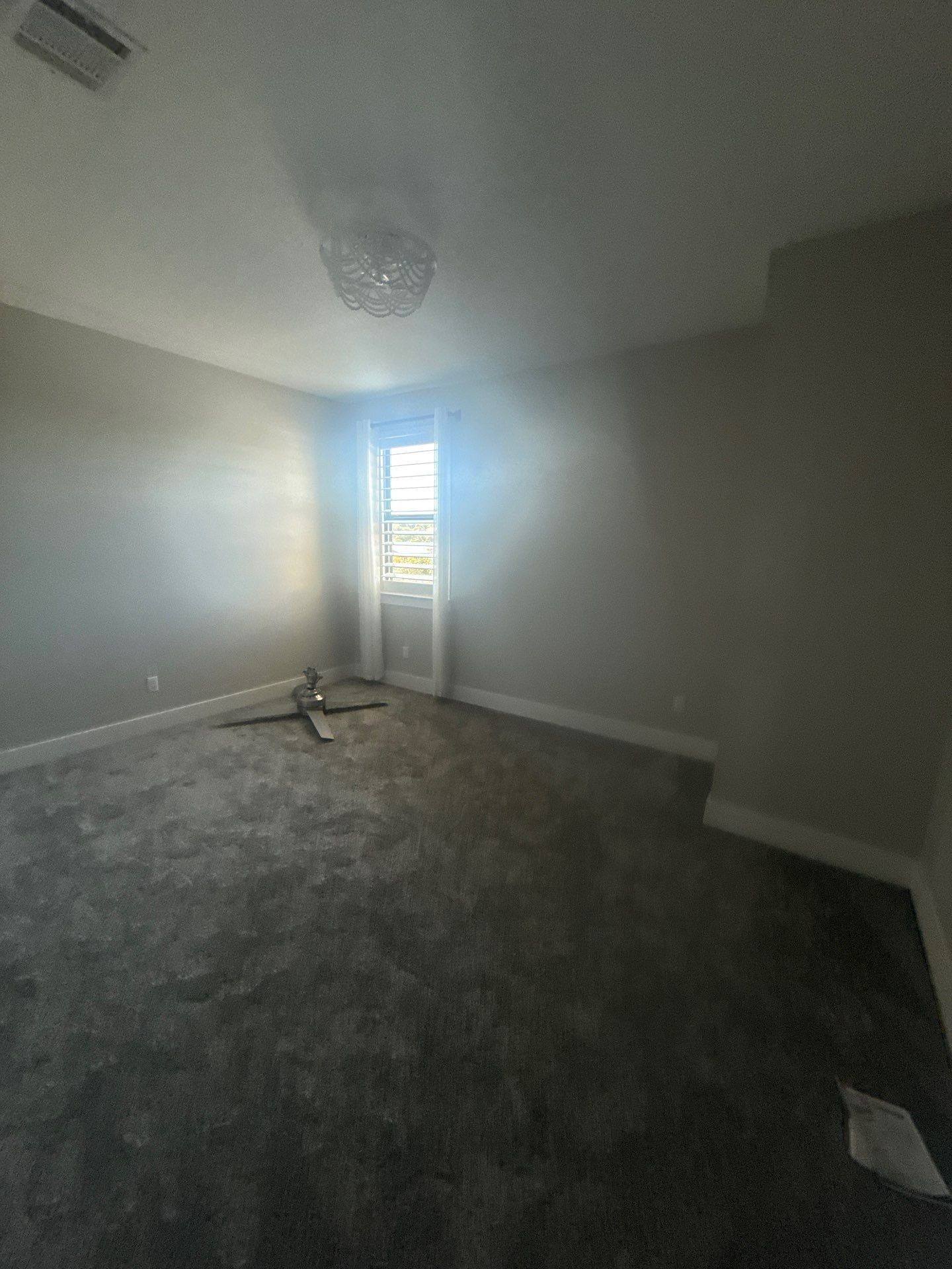 Bedroom at a property on Willow Hill Dr in Georgetown, TX ahead of interior painting by Hill Country Painting