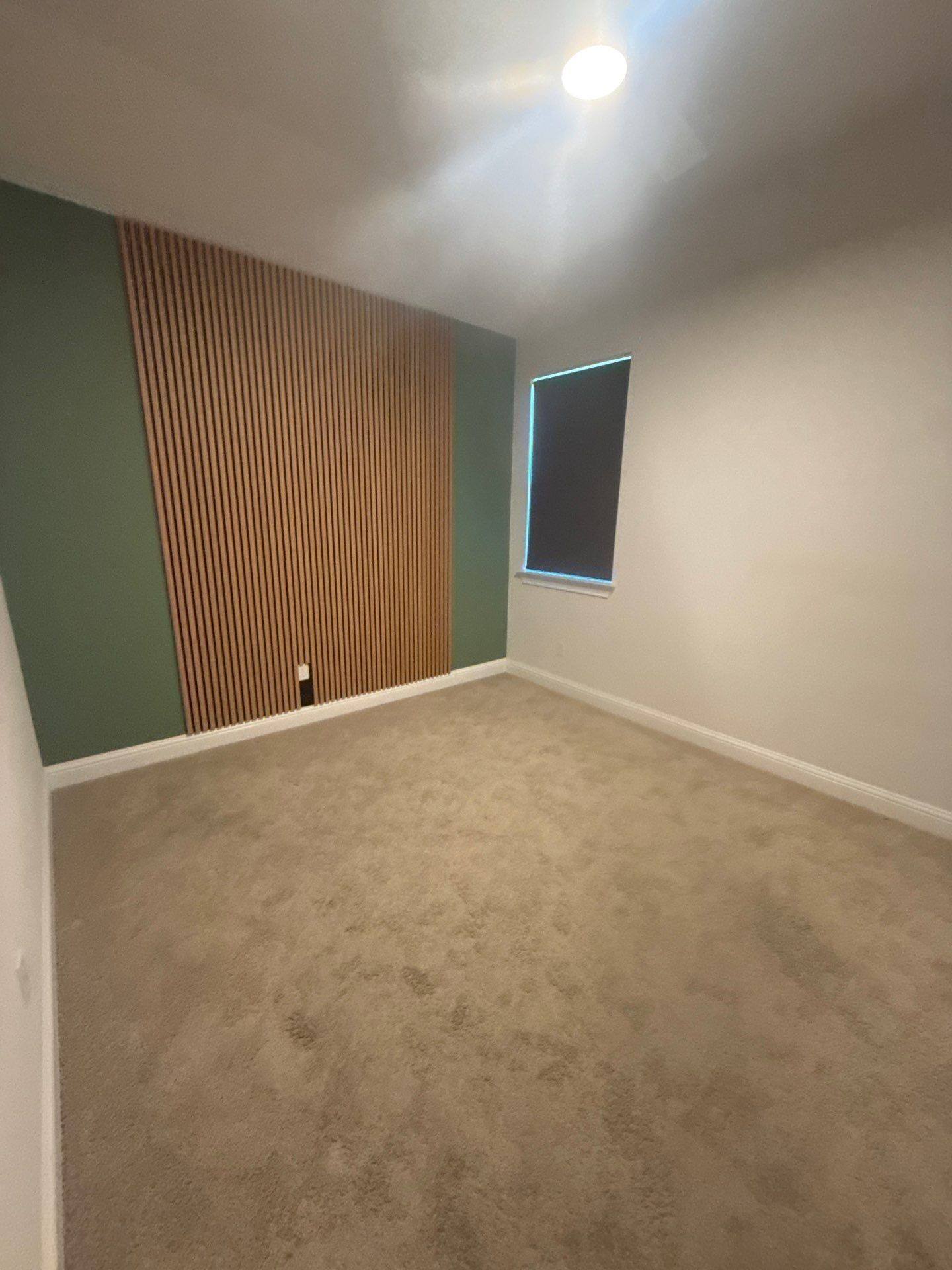 Bedroom with accent wall