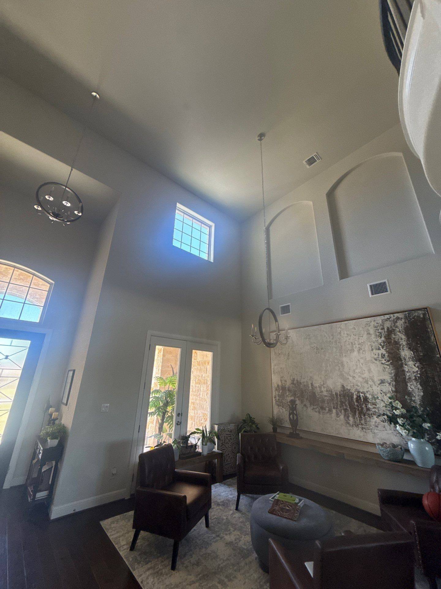 Two-story living room with vaulted ceiling