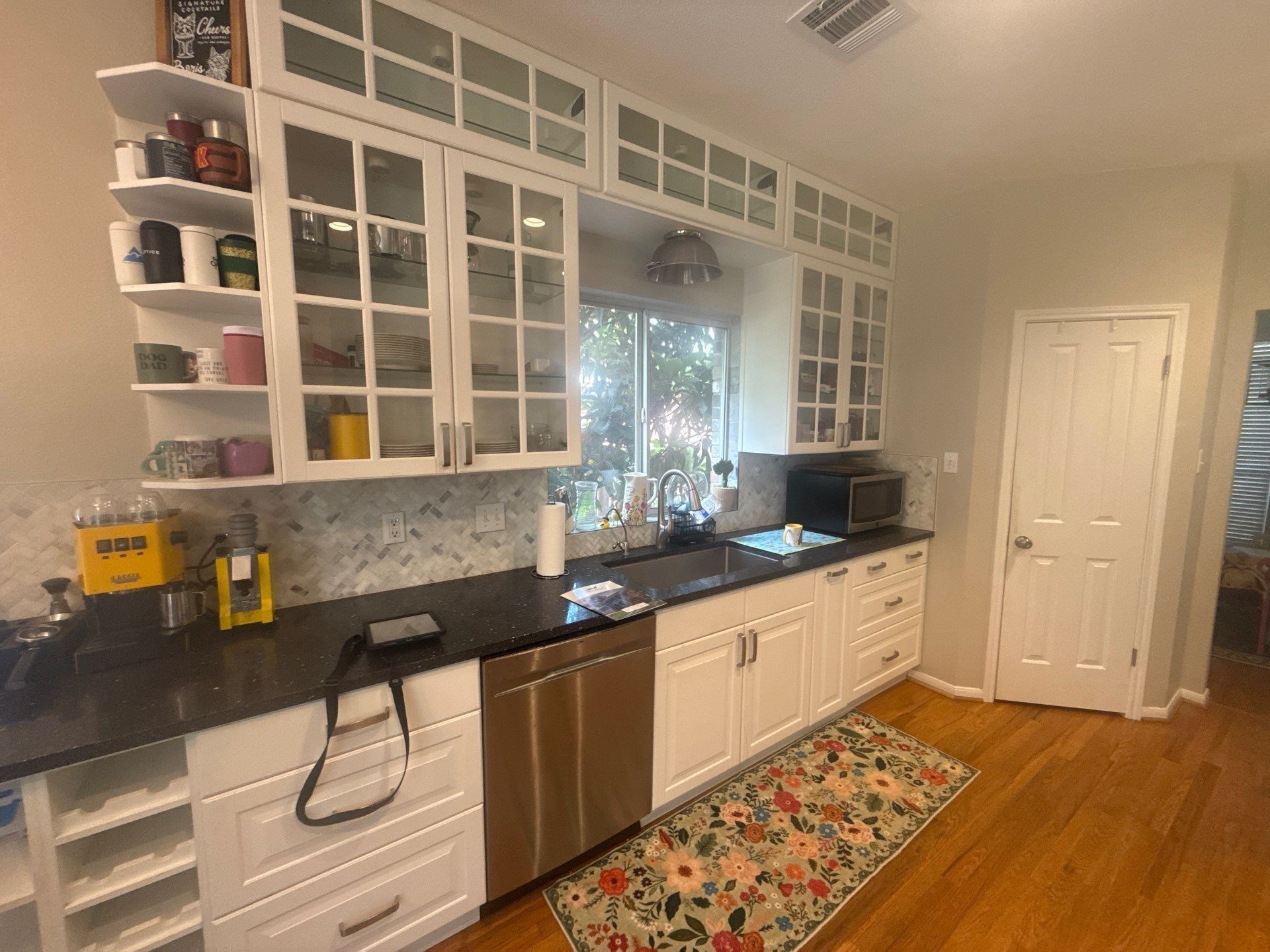 Kitchen glass-front and lower cabinets ahead of painting