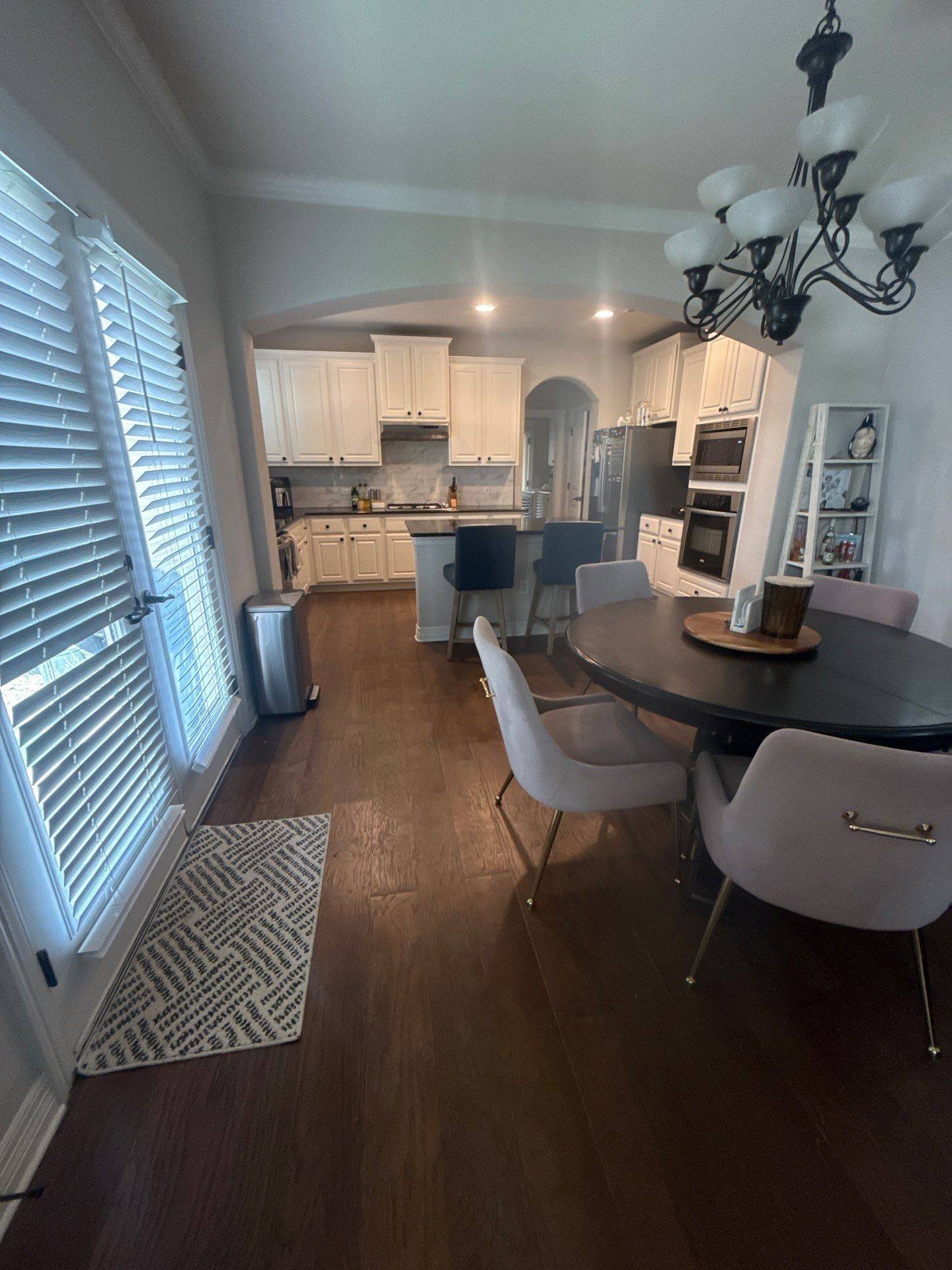 Open-concept kitchen and dining area ahead of painting