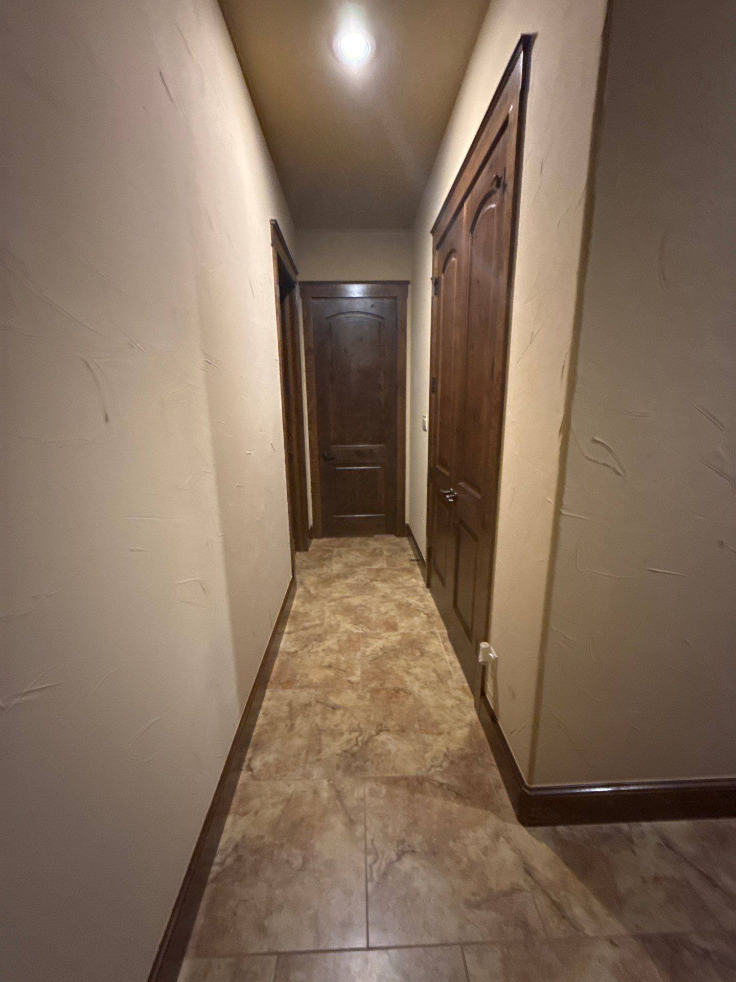 Hallway of the home ahead of painting