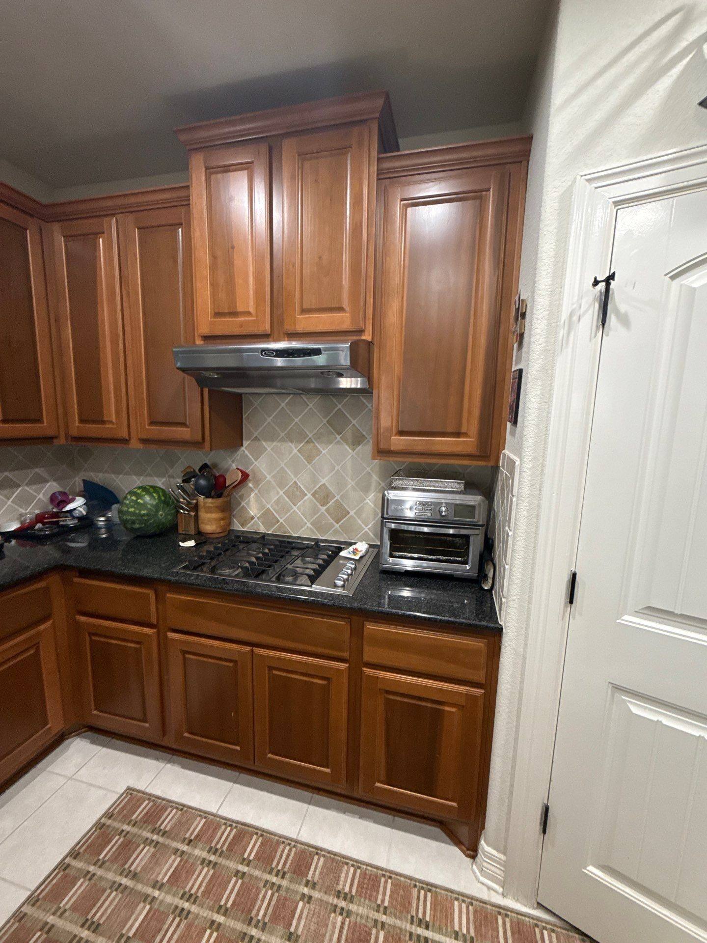 Kitchen stove and cabinets ahead of painting