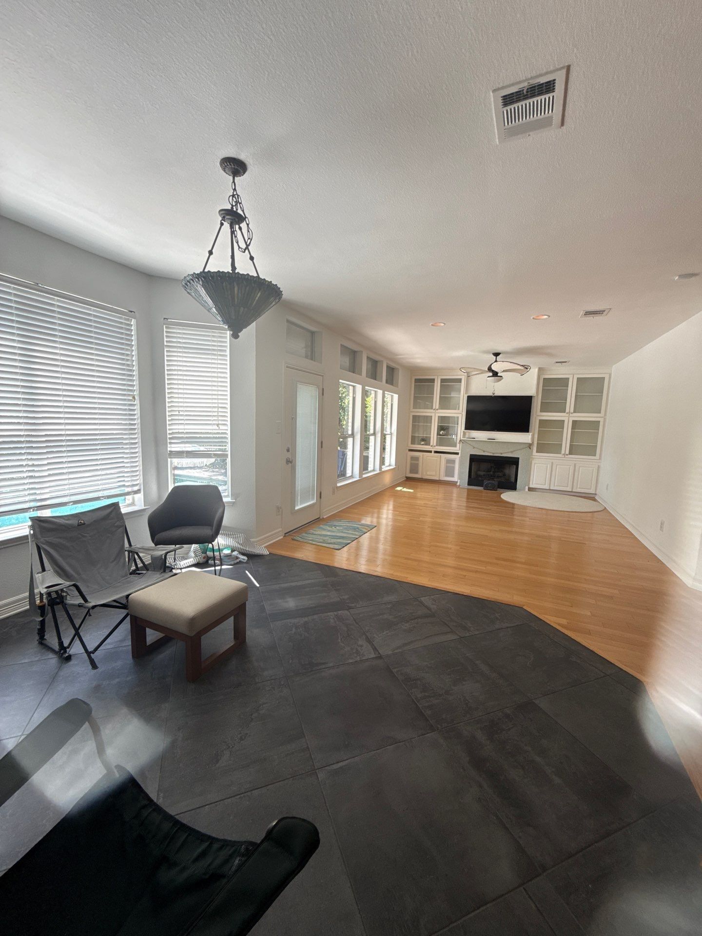 Living room with fireplace and built-in shelving