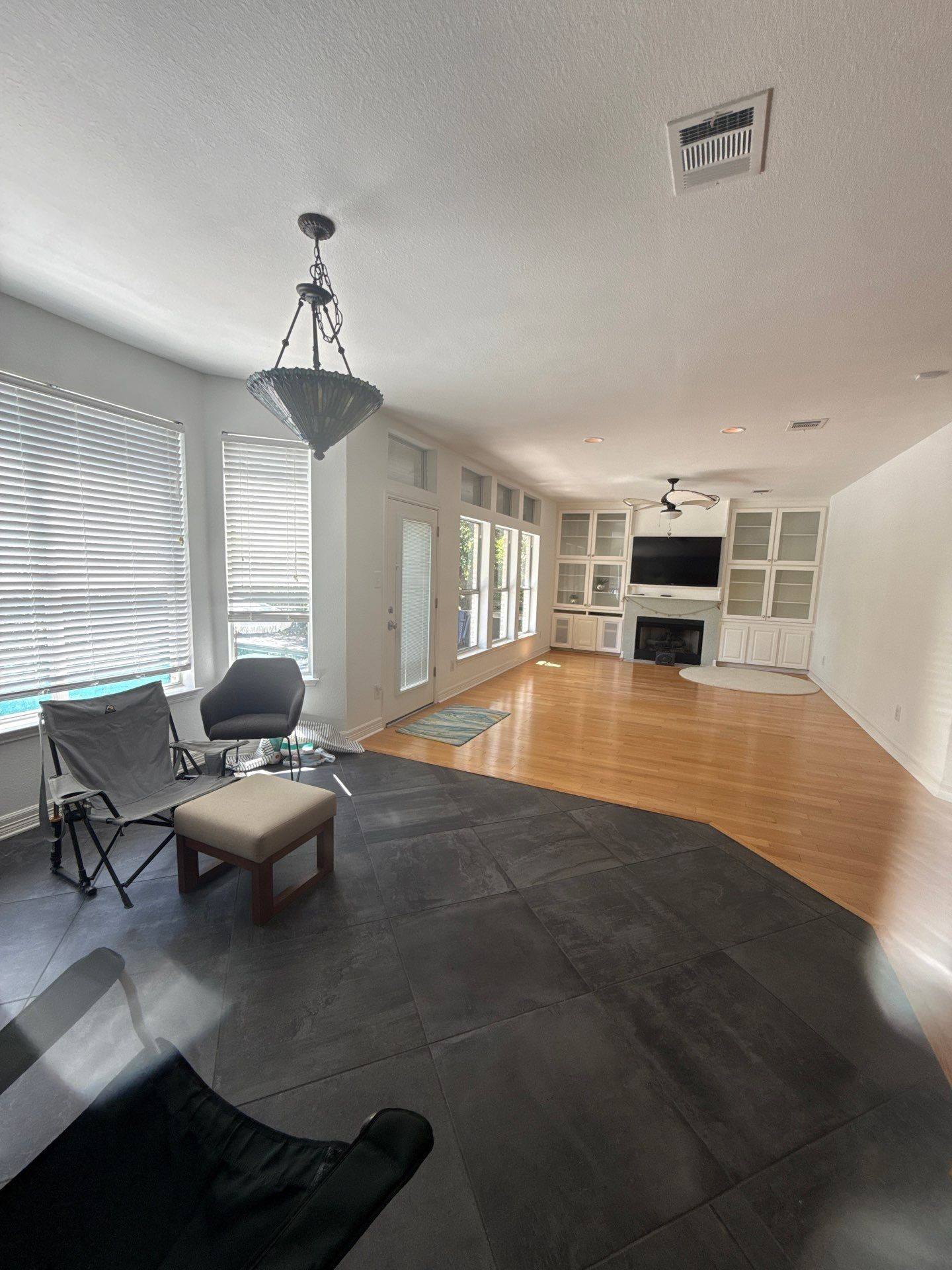 Living room with fireplace and built-in shelving