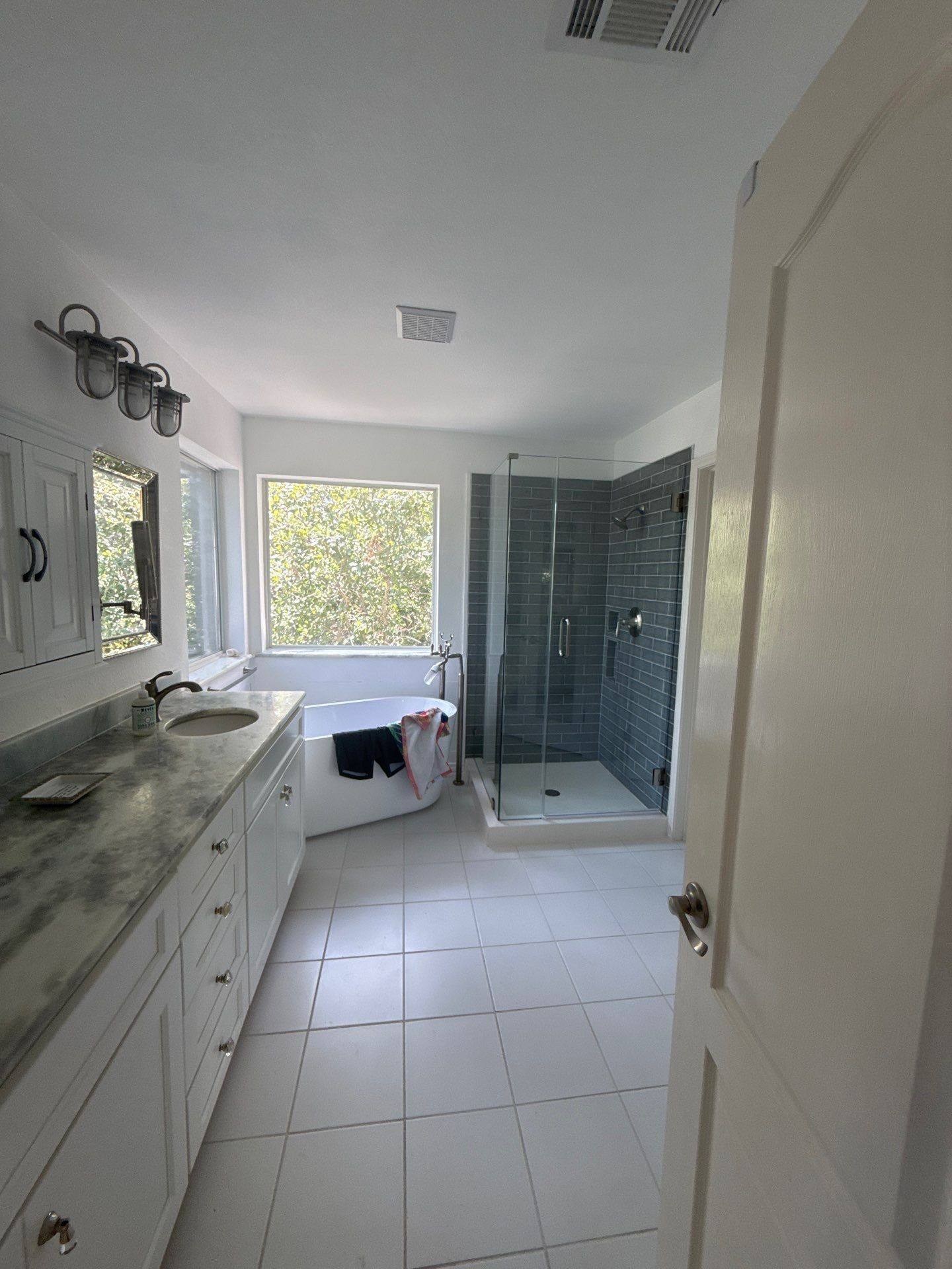 Master bathroom with soaking tub and walk-in shower