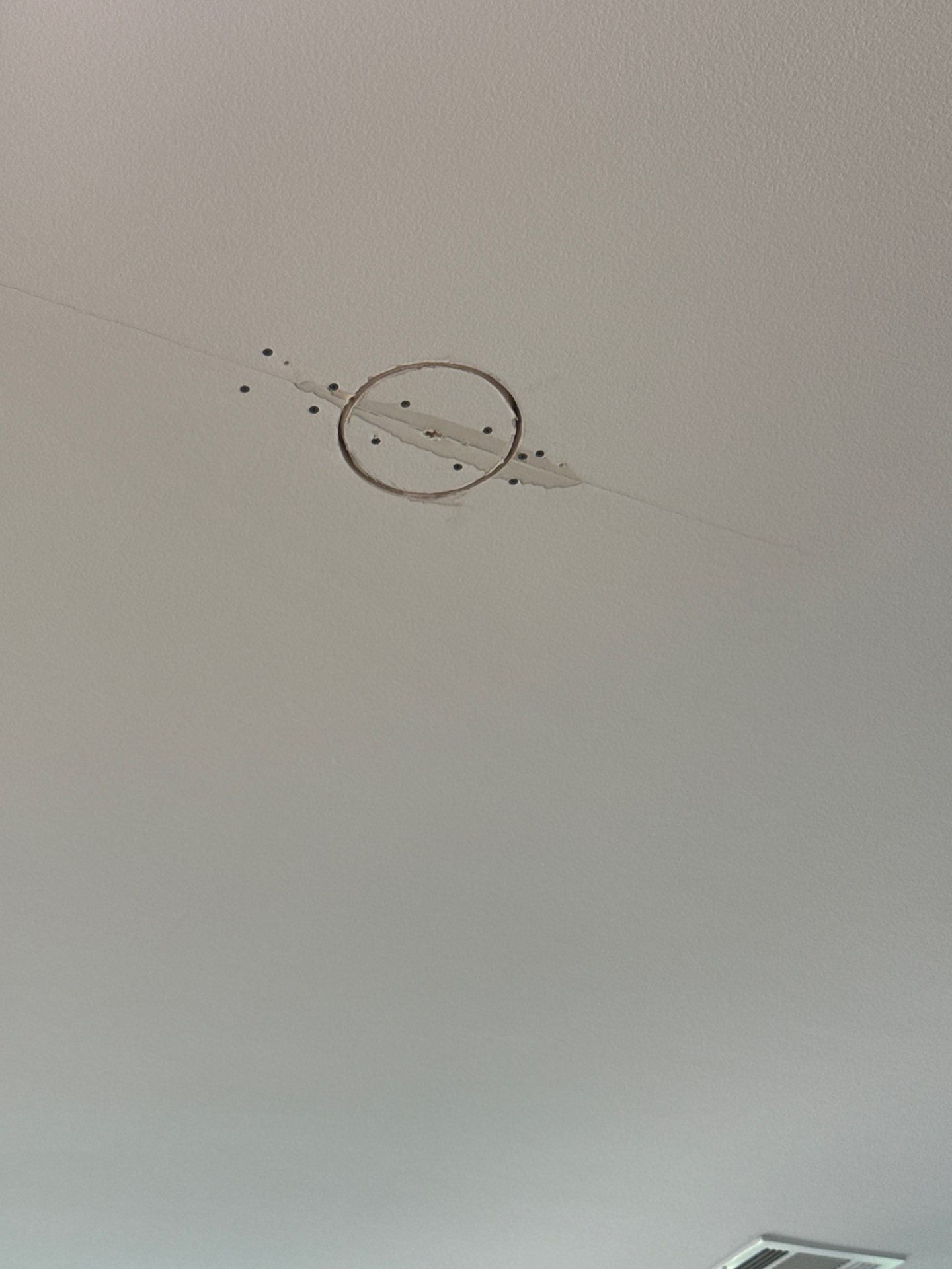 Kitchen ceiling repair area ahead of painting
