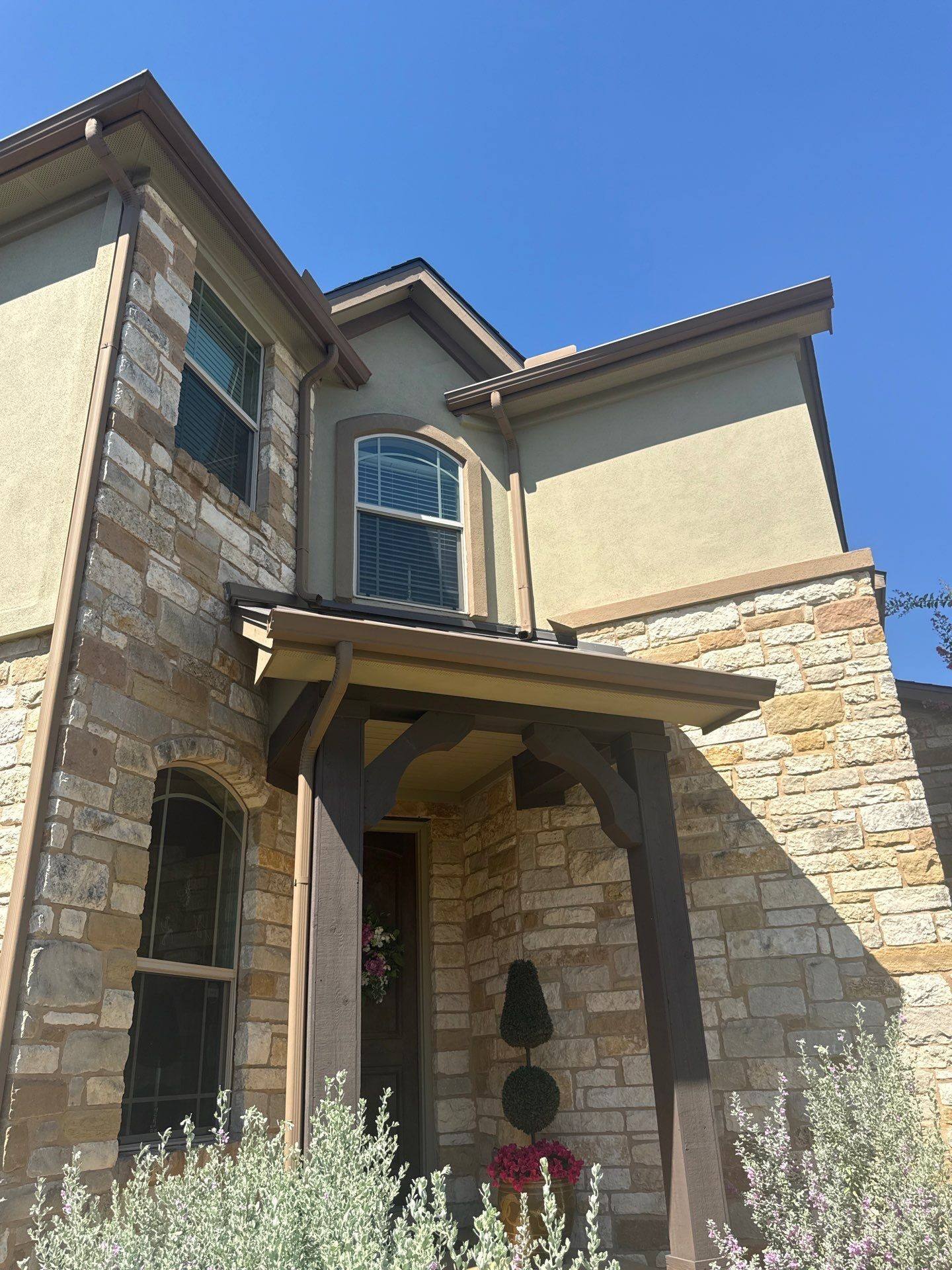 Front entry and fascia detail ahead of painting