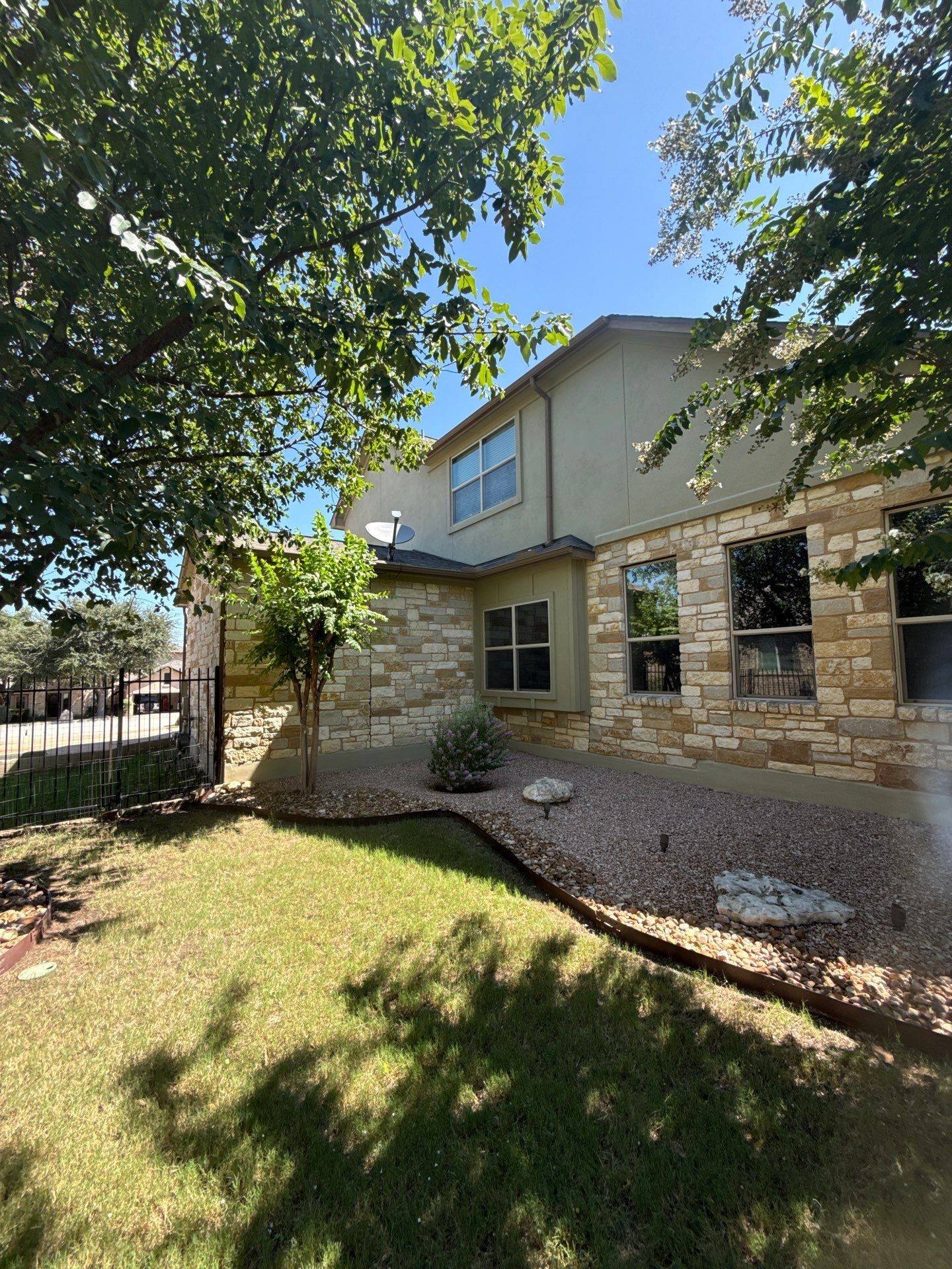 Right side of house, wide view ahead of painting