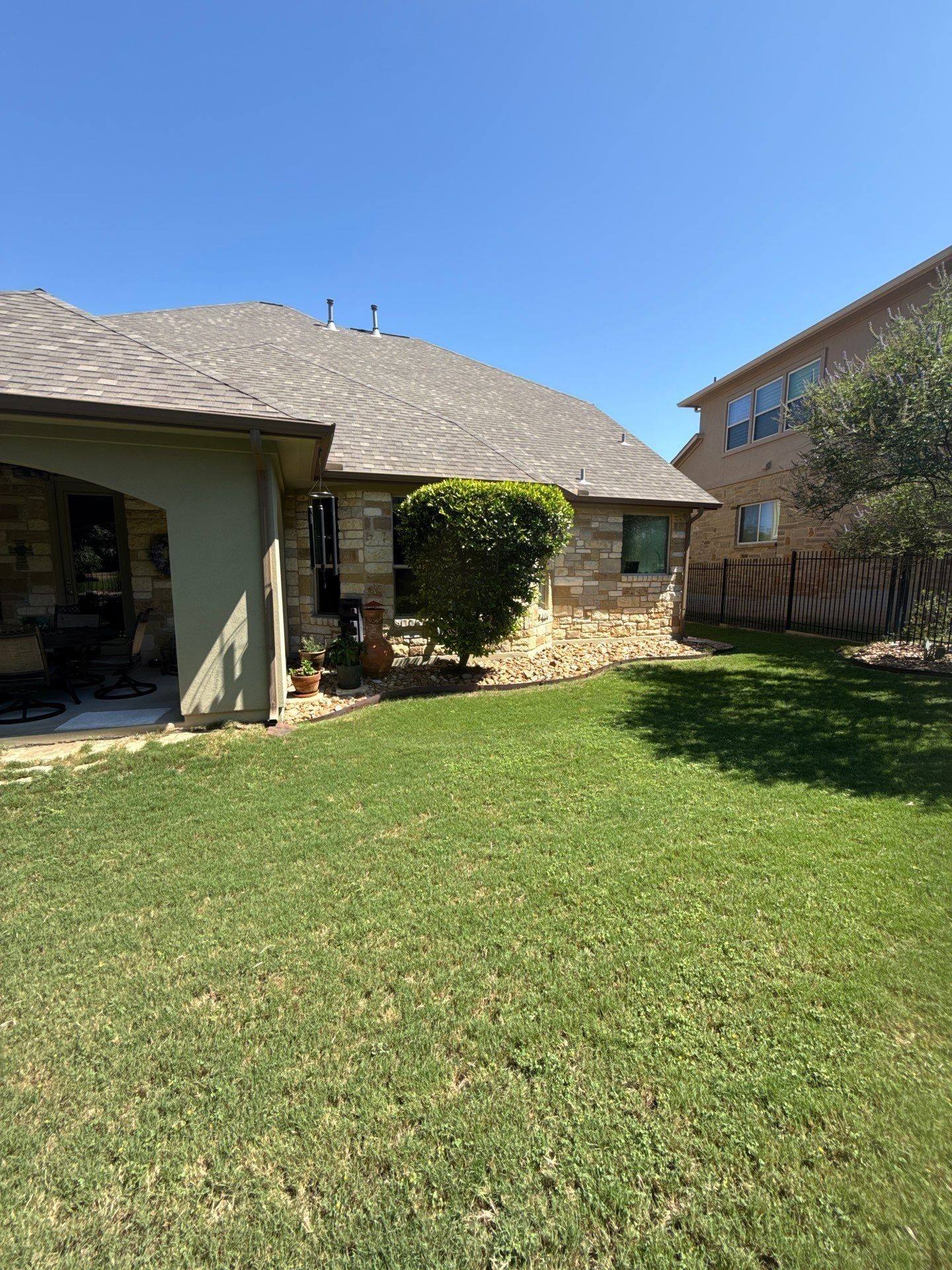 Backyard exterior view of the home