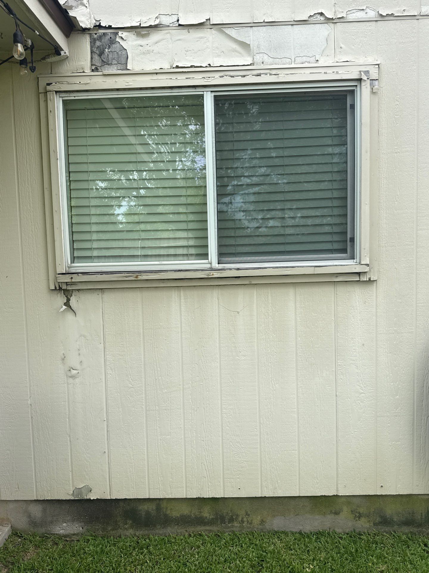 Window trim paint peeling detail ahead of painting