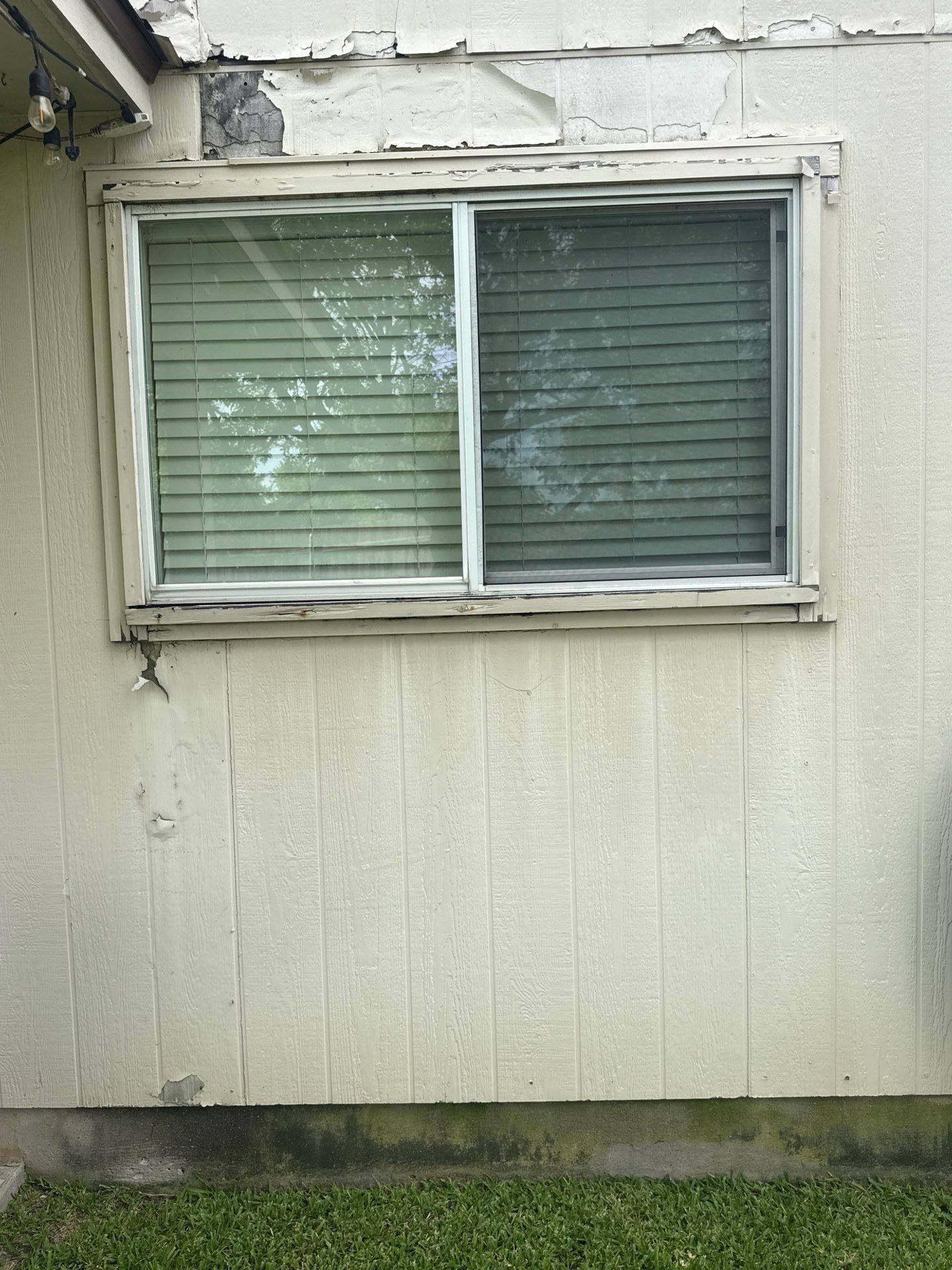 Window trim paint peeling detail ahead of painting