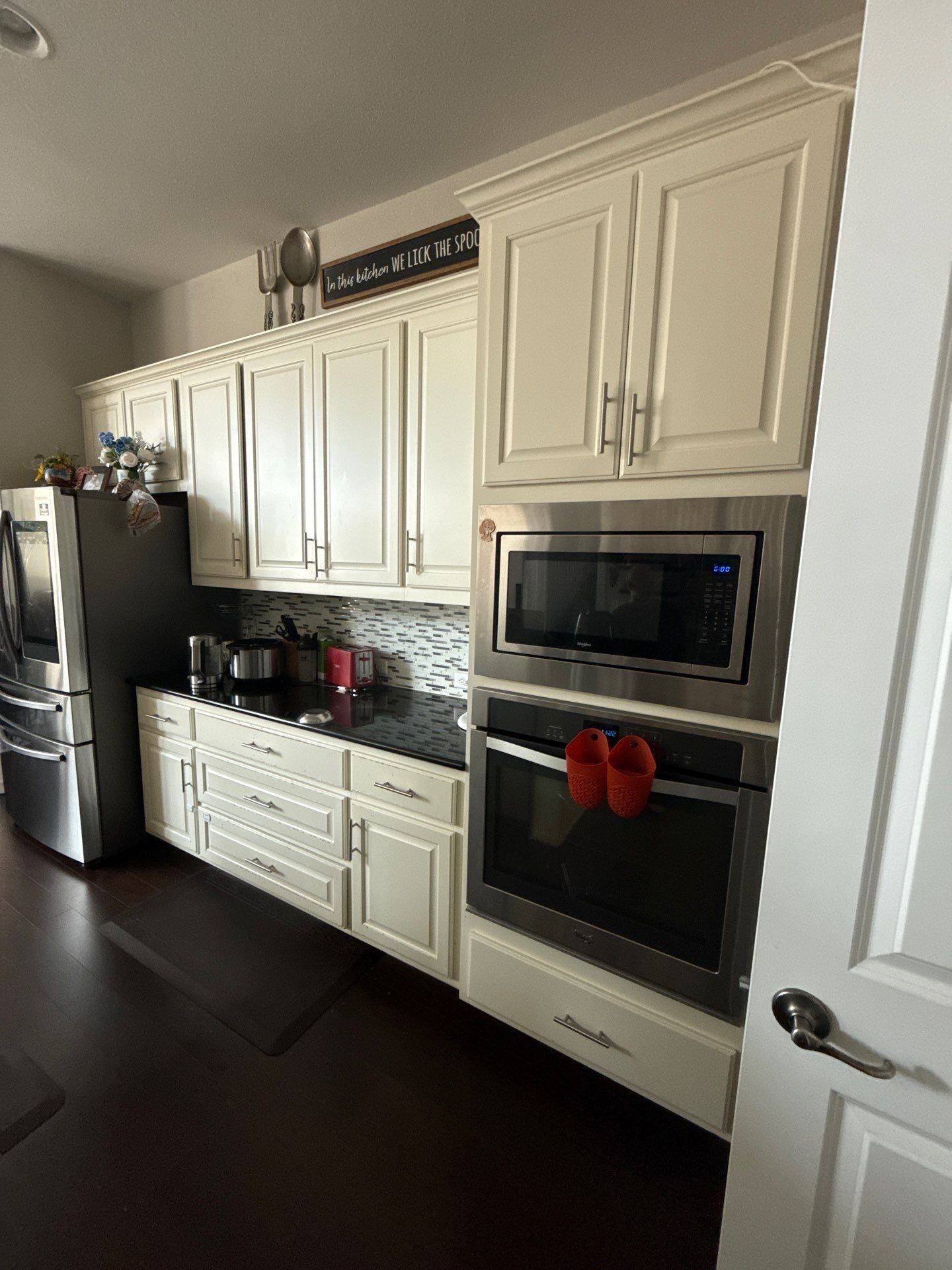 Kitchen cabinets and wall oven ahead of refinishing