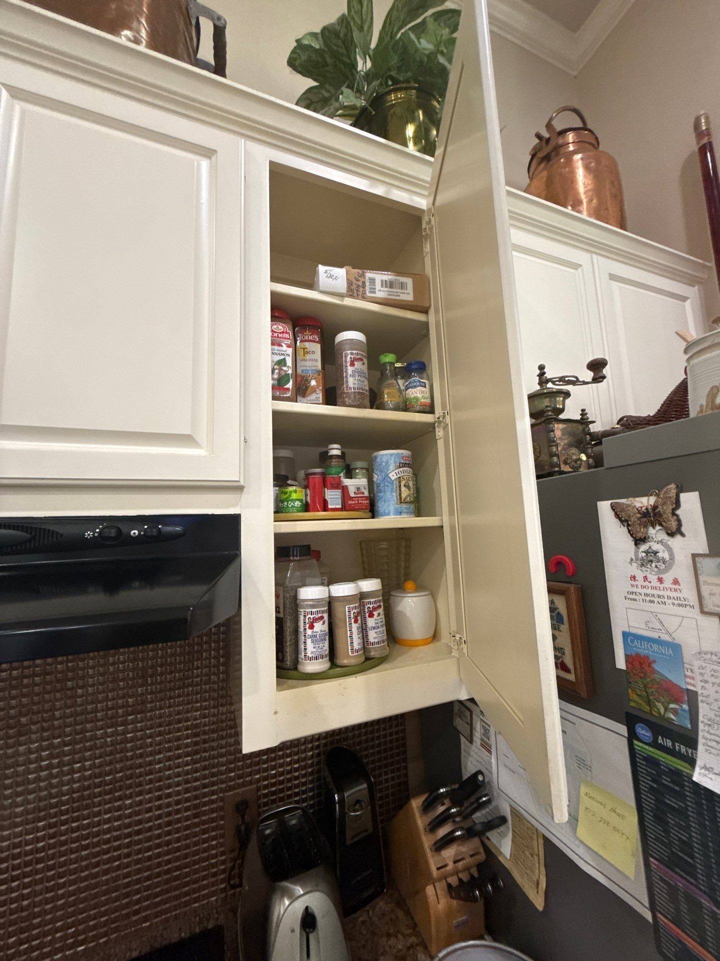 Kitchen cabinet shelves ahead of painting