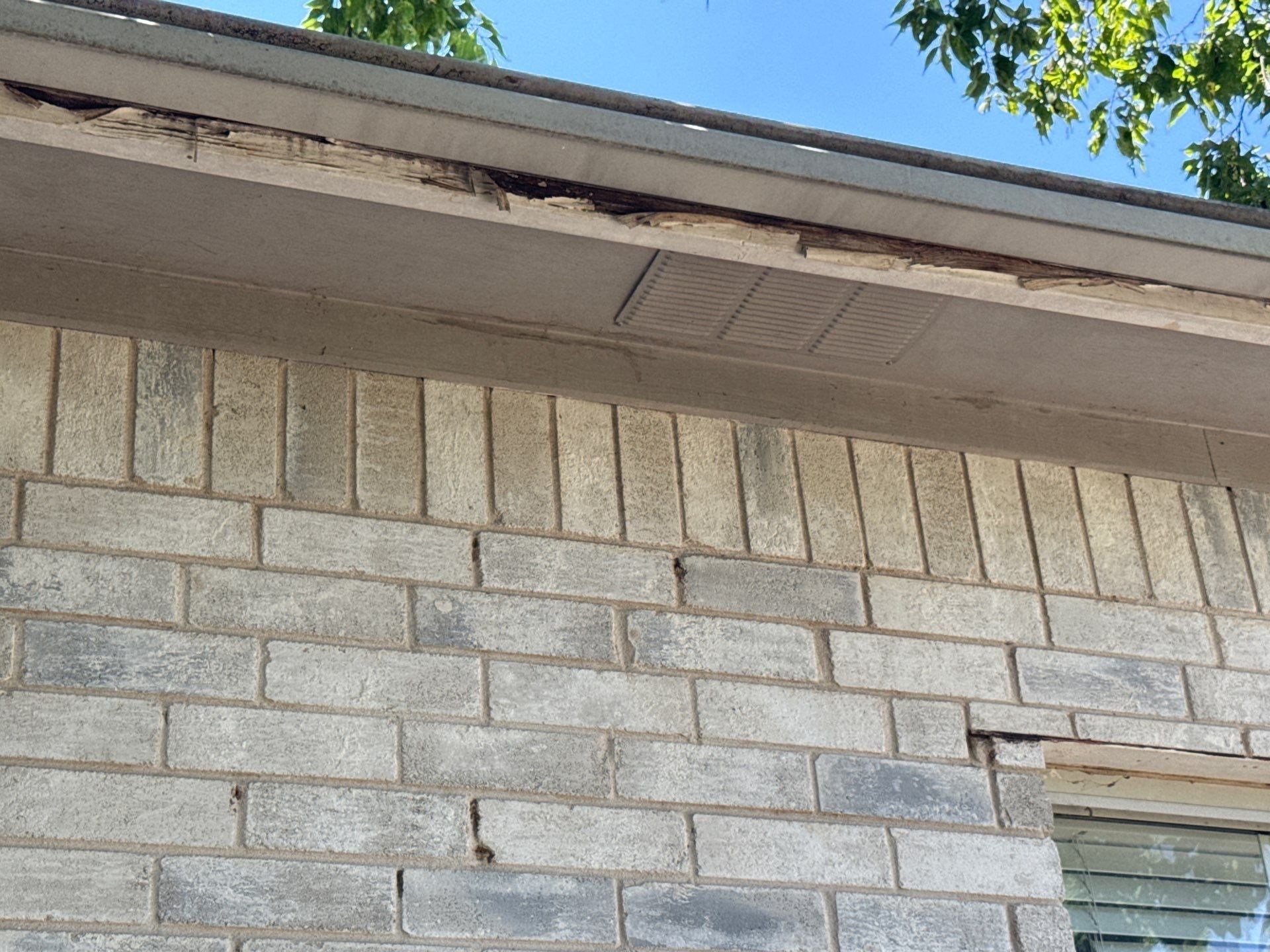Soffit and fascia showing rotted wood ahead of exterior painting
