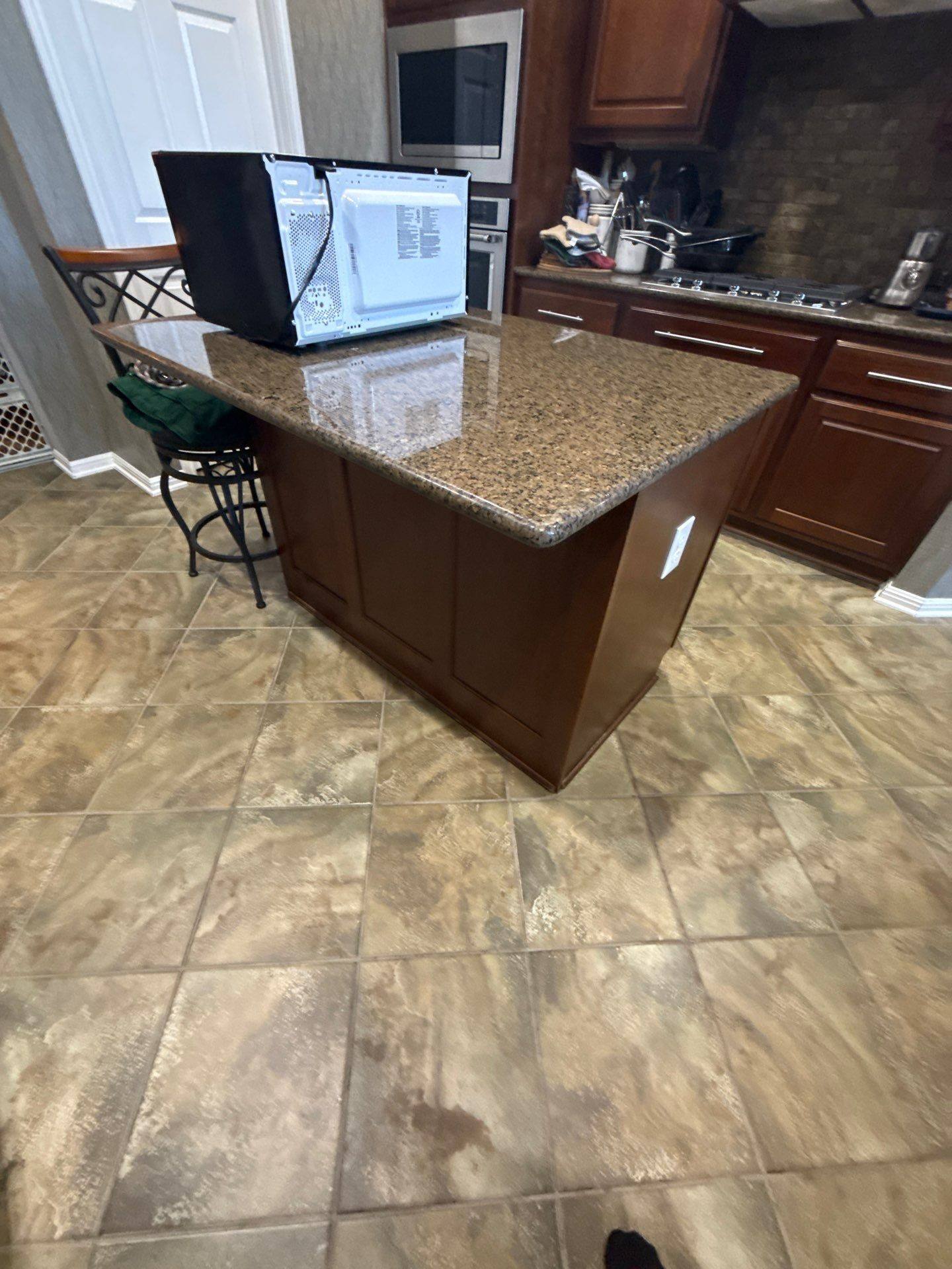 Kitchen cabinets and island ahead of painting
