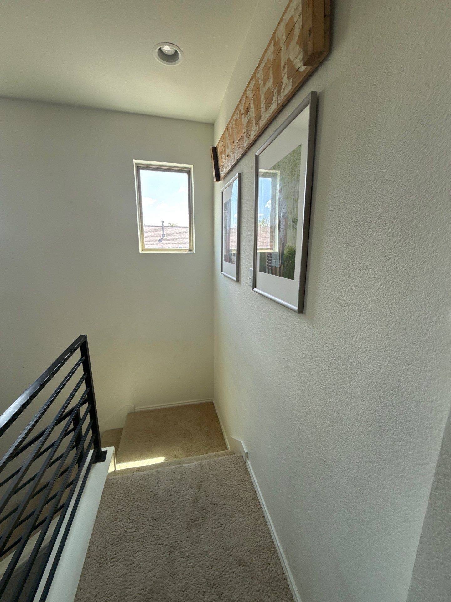 Stairwell hallway ahead of painting