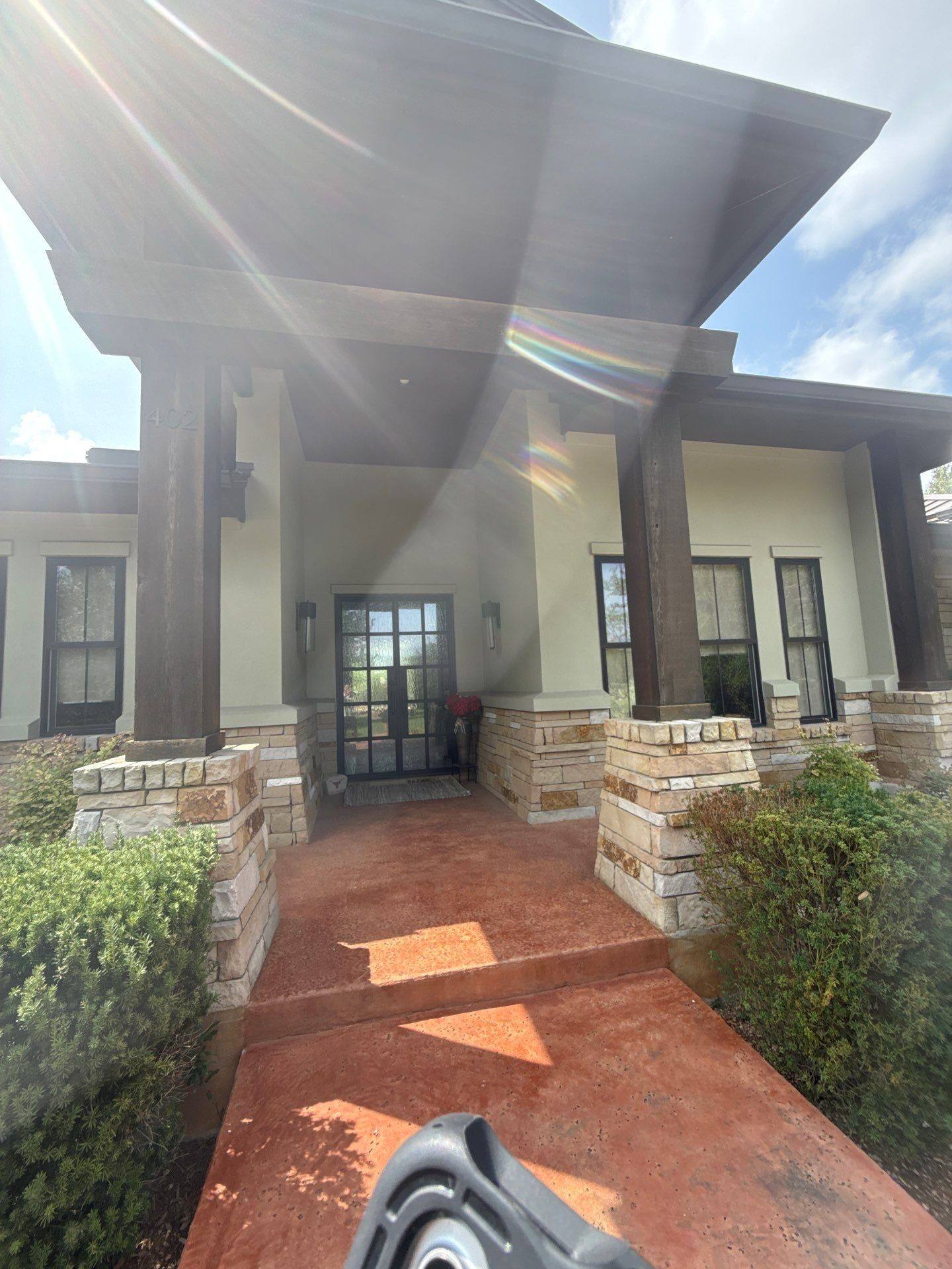 Front entry porch ahead of estimate