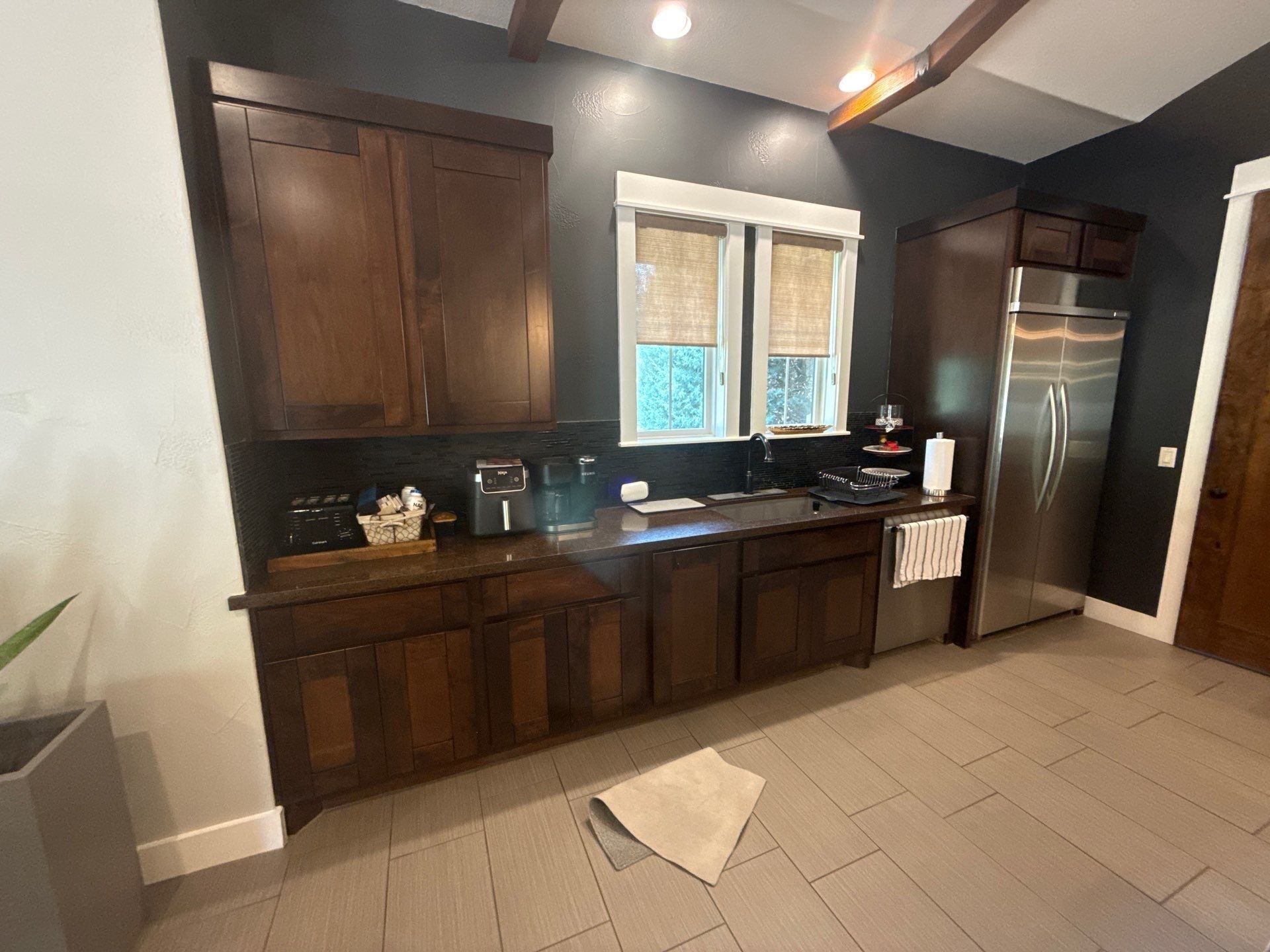 Kitchen cabinetry and appliance wall