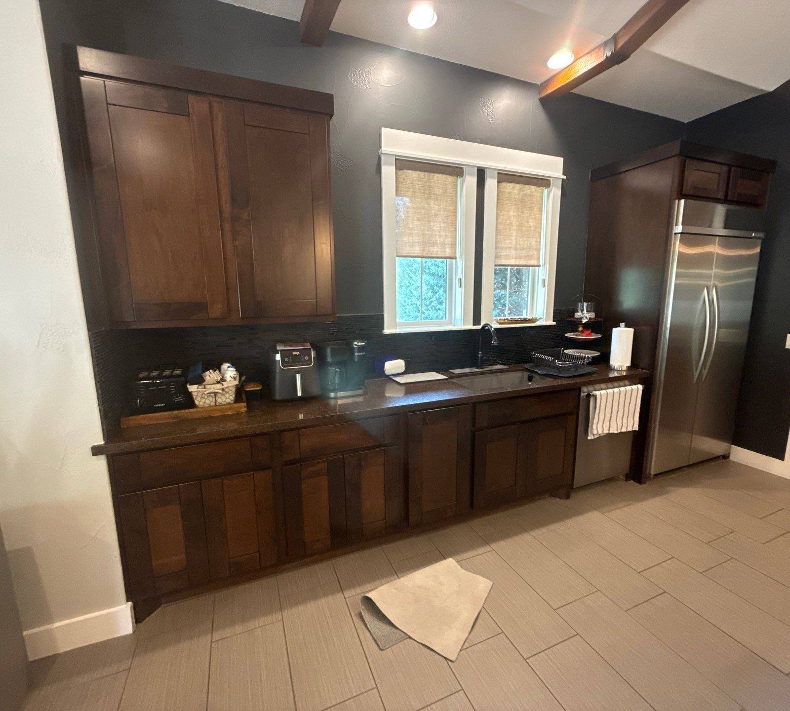 Kitchen cabinetry and appliance wall