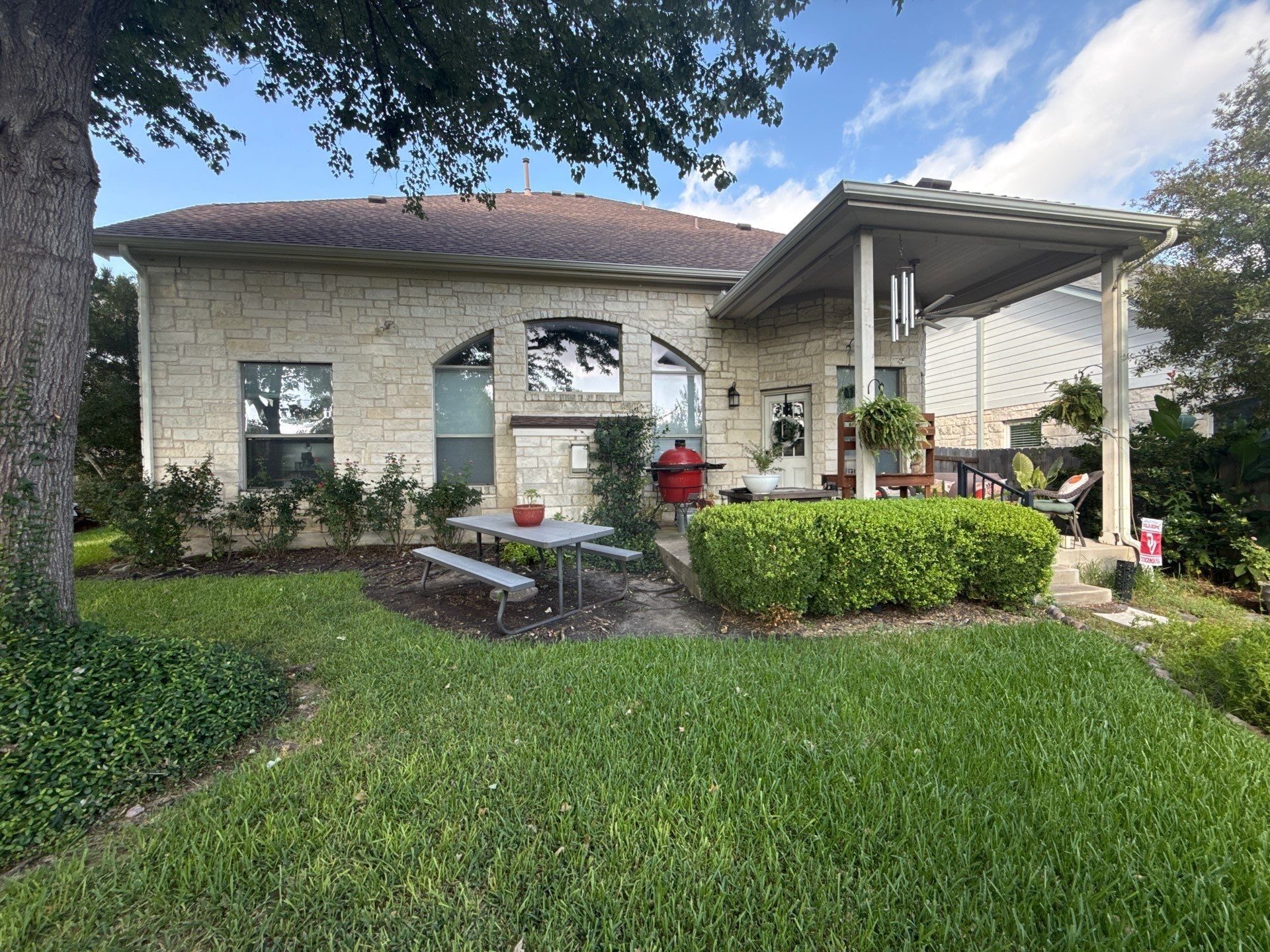 Back exterior with porch ceiling and columns