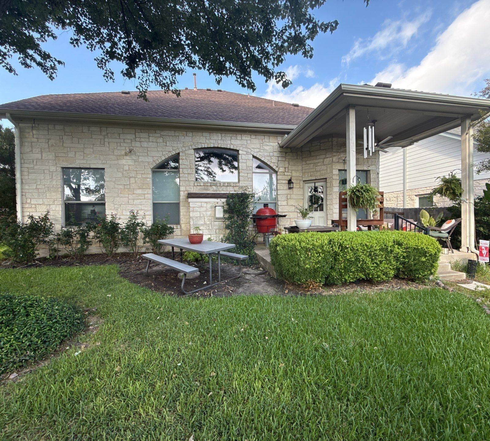 Back exterior with porch ceiling and columns