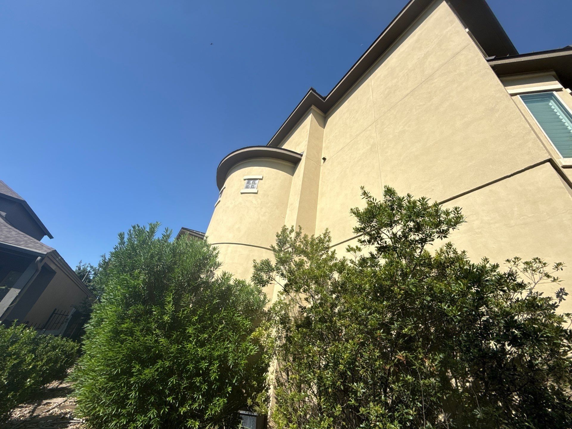 Right side of home with architectural stucco detail