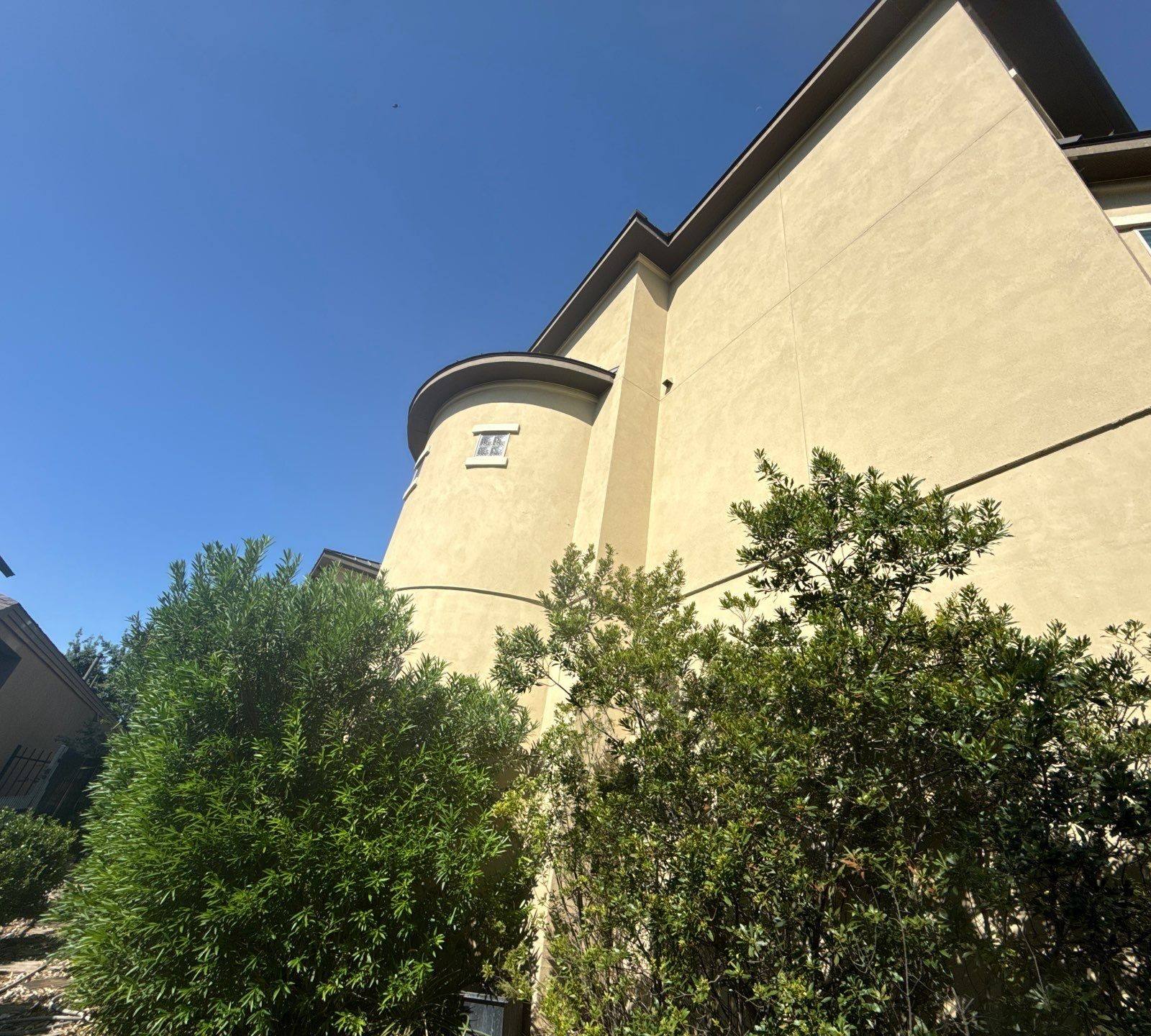Right side of home with architectural stucco detail