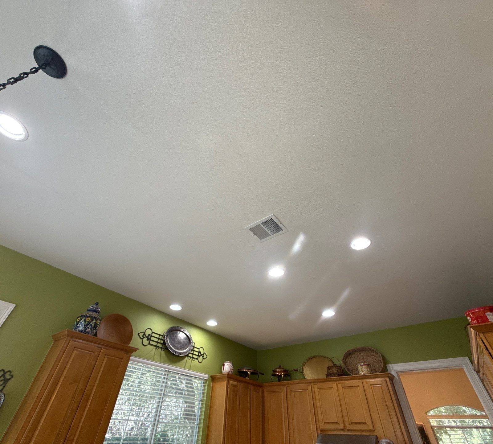 Kitchen ceiling and green walls ahead of painting