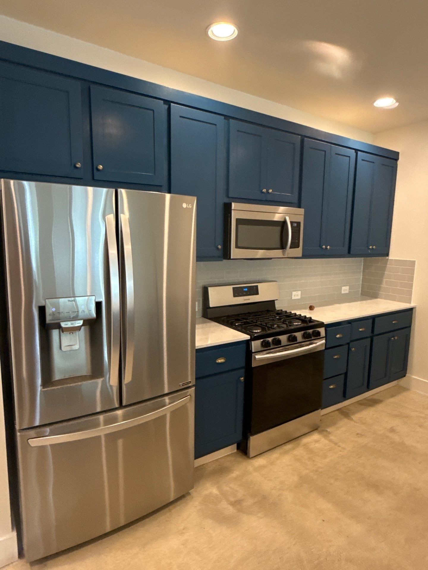 Kitchen wall of cabinets and appliances