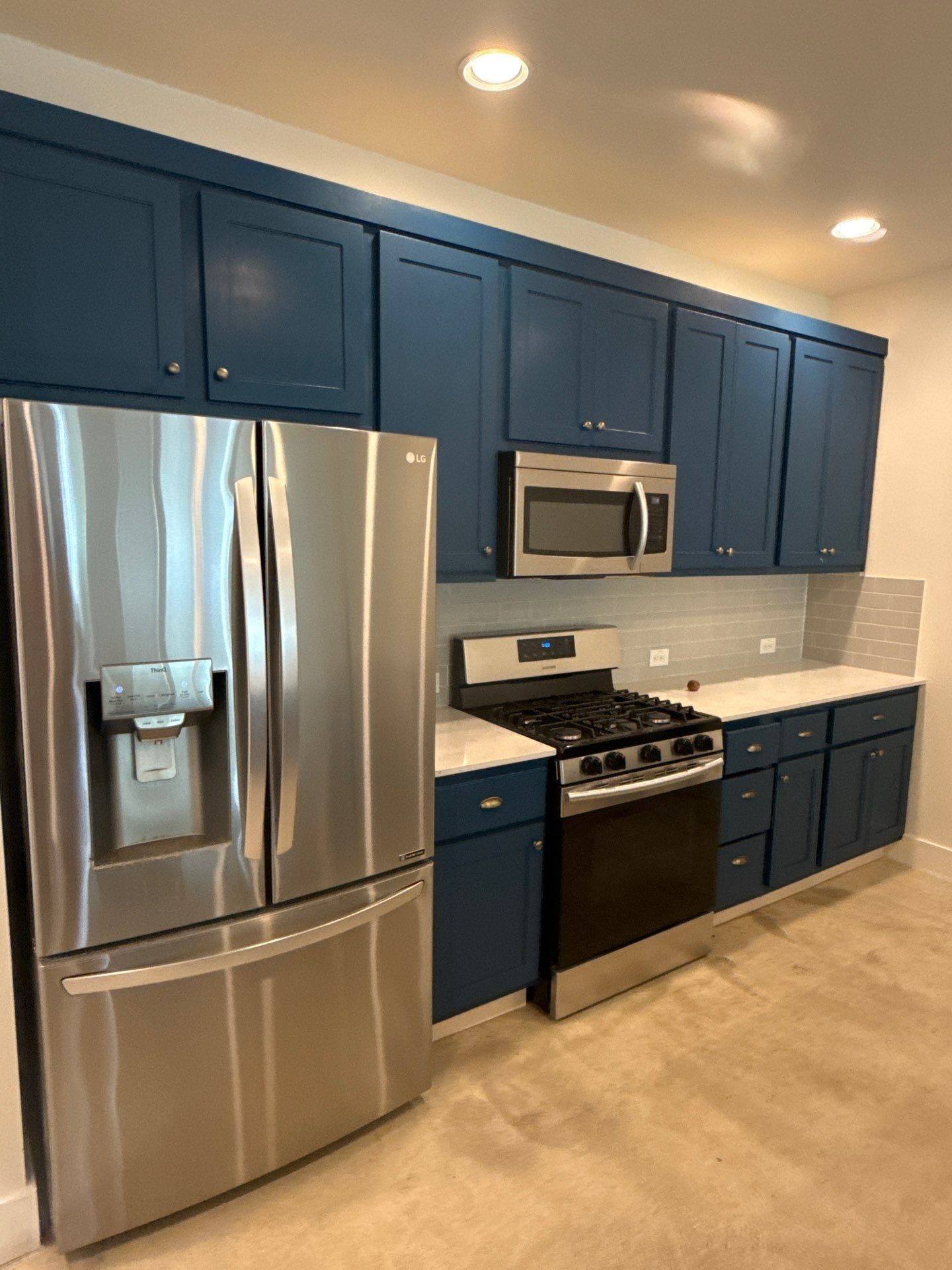 Kitchen wall of cabinets and appliances