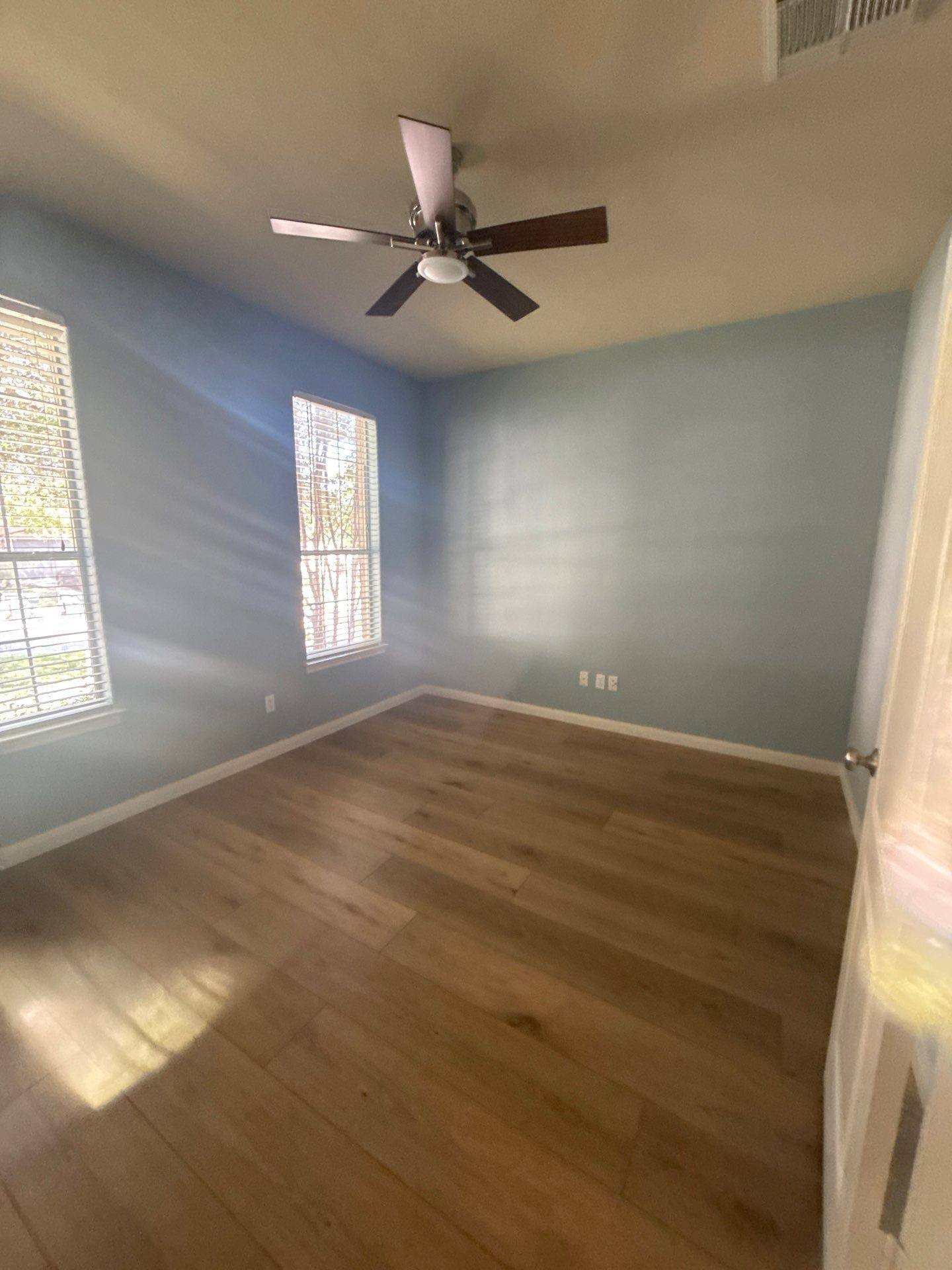 Bedroom with blue accent wall
